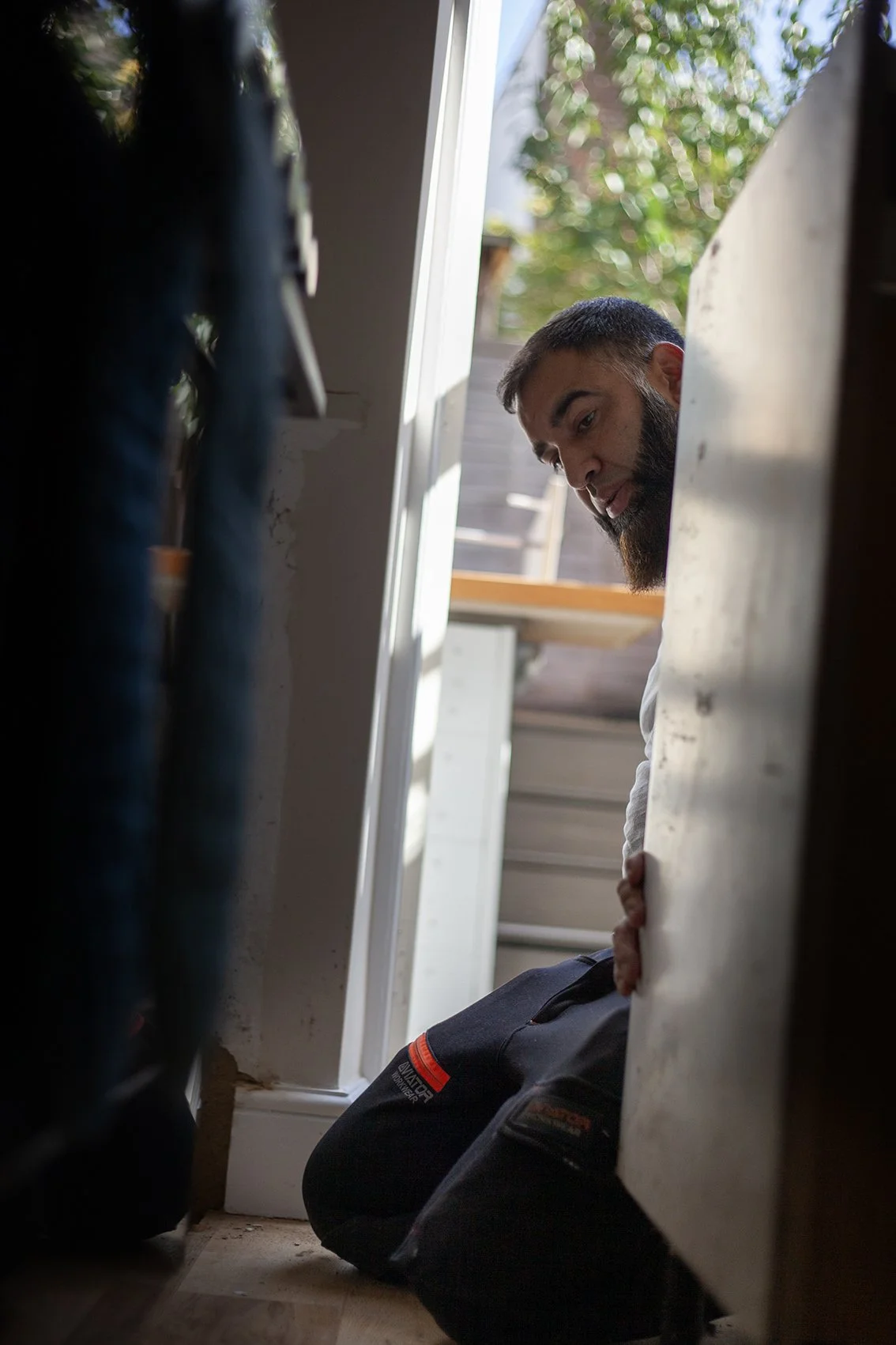 Sajid Khan, a handyman. Working at a domestic property in St Albans.
UK, 2025