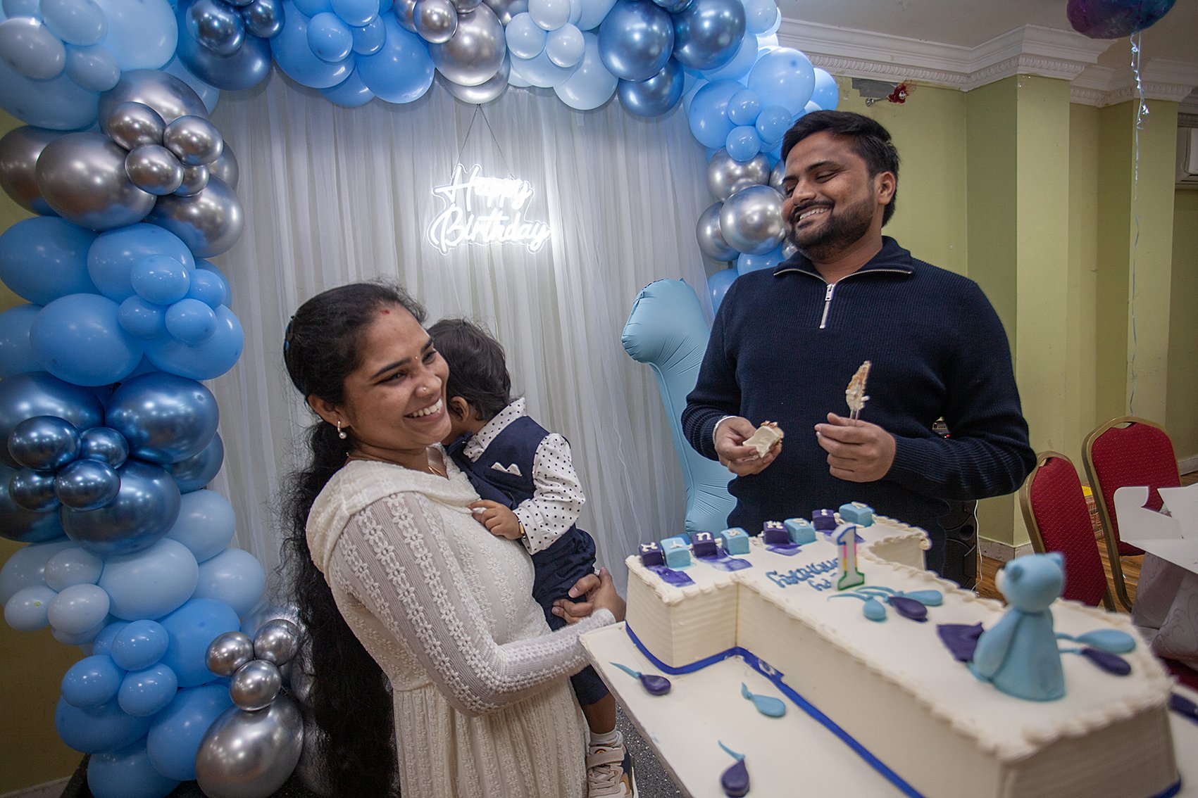 Kasinath's birthday party. East Ham, London. 2025 Kasinath, his wife and daughter.