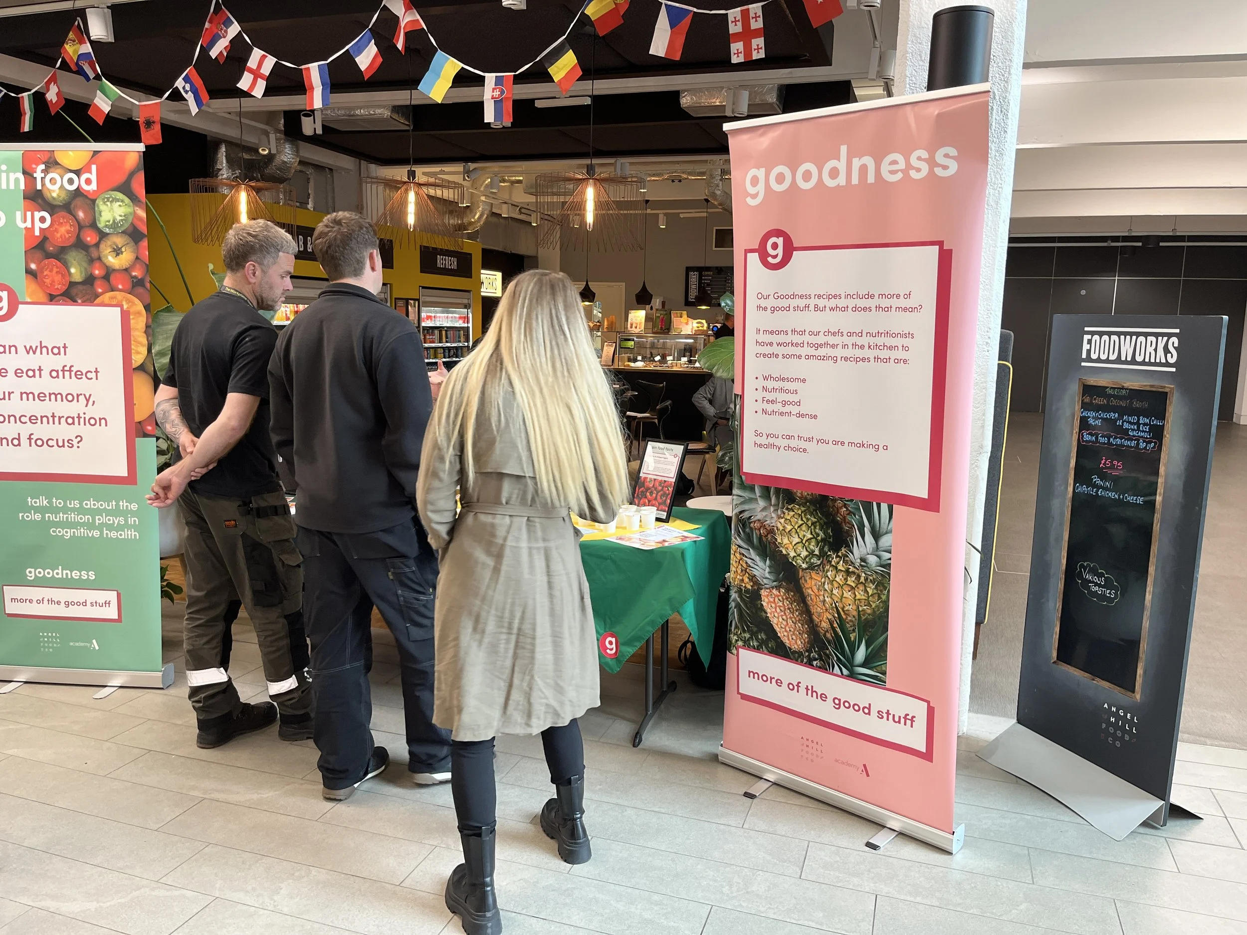 People crowding a 'brain food pop up' by nutritionist