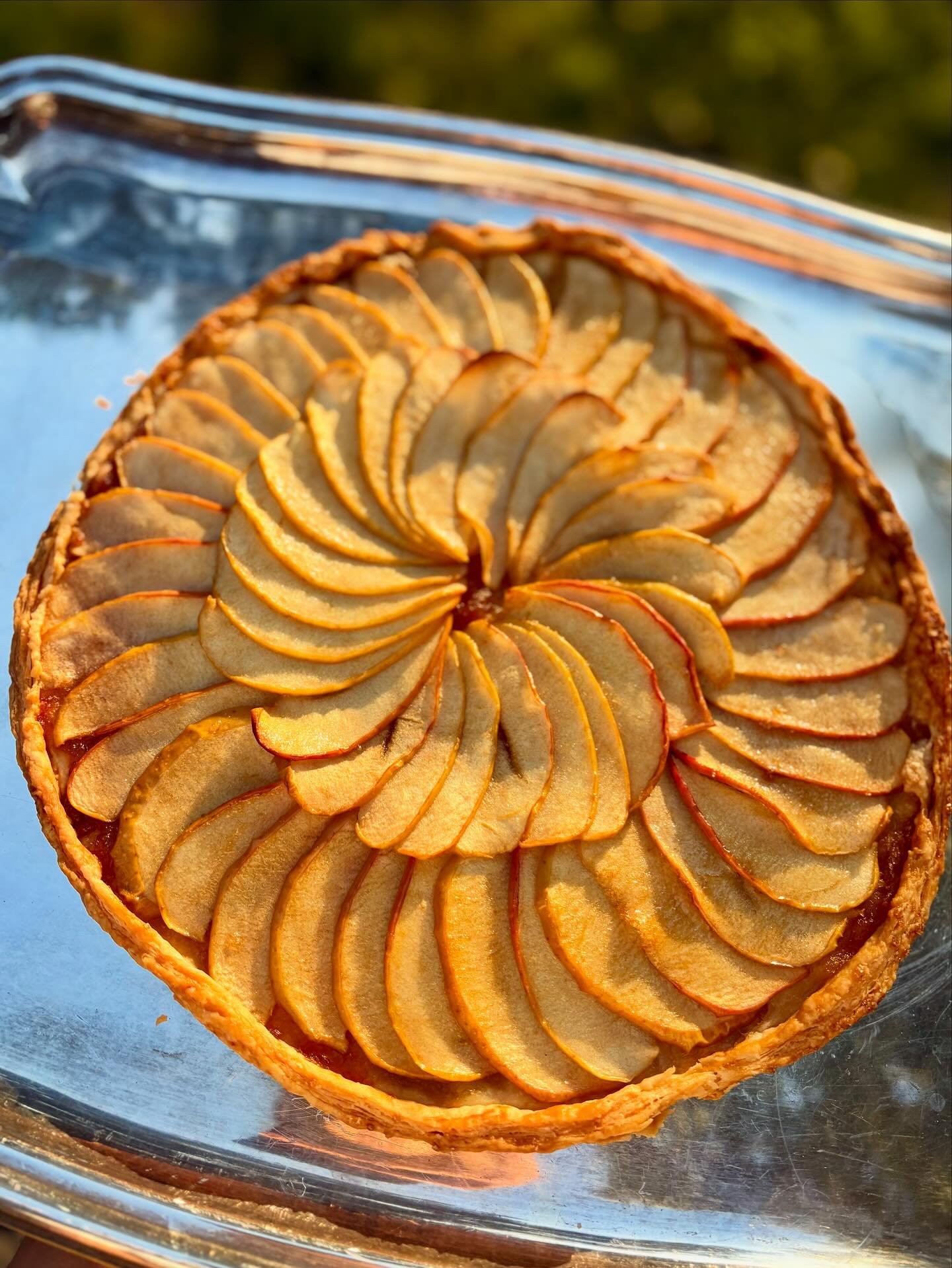 Pre-order now for Saturday! This week's Apple Tarte Fine has layers of fresh apples from @milkpailfarmorchard, paired with homemade apple butter baked in a buttery and flaky crust. A touch of honey adds the finishing touch. Pre order in Link in bio.