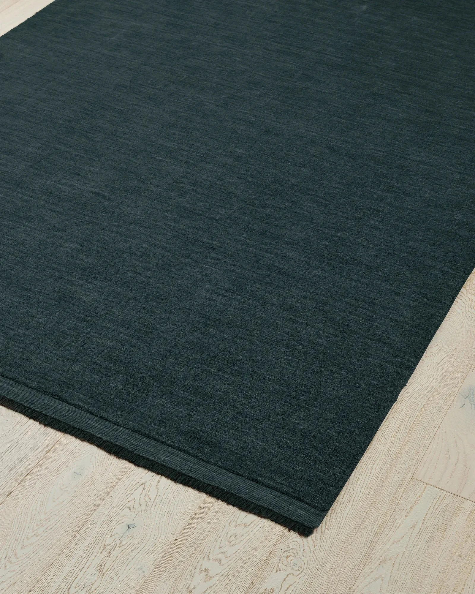 recyTmG3nuMw5Zyqh_silvio-rug-dusk-updated-corner-2025.jpg