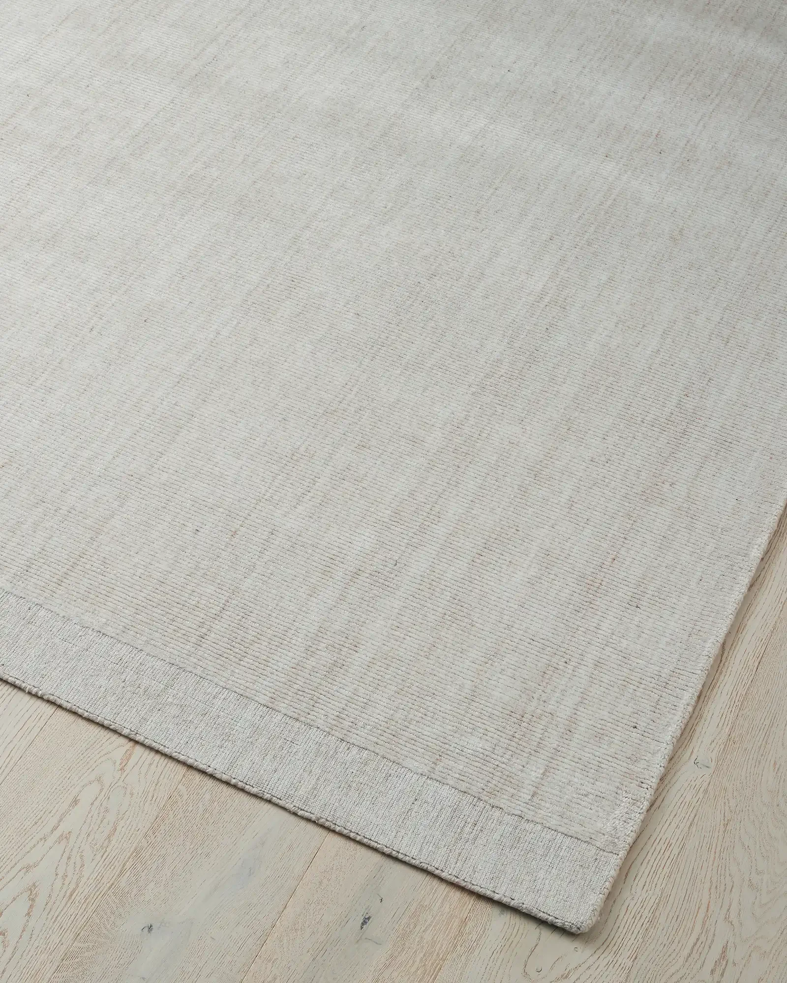 recfVYAiuqoBkPDO9_Travertine-Rug-Buff-Corner.webp