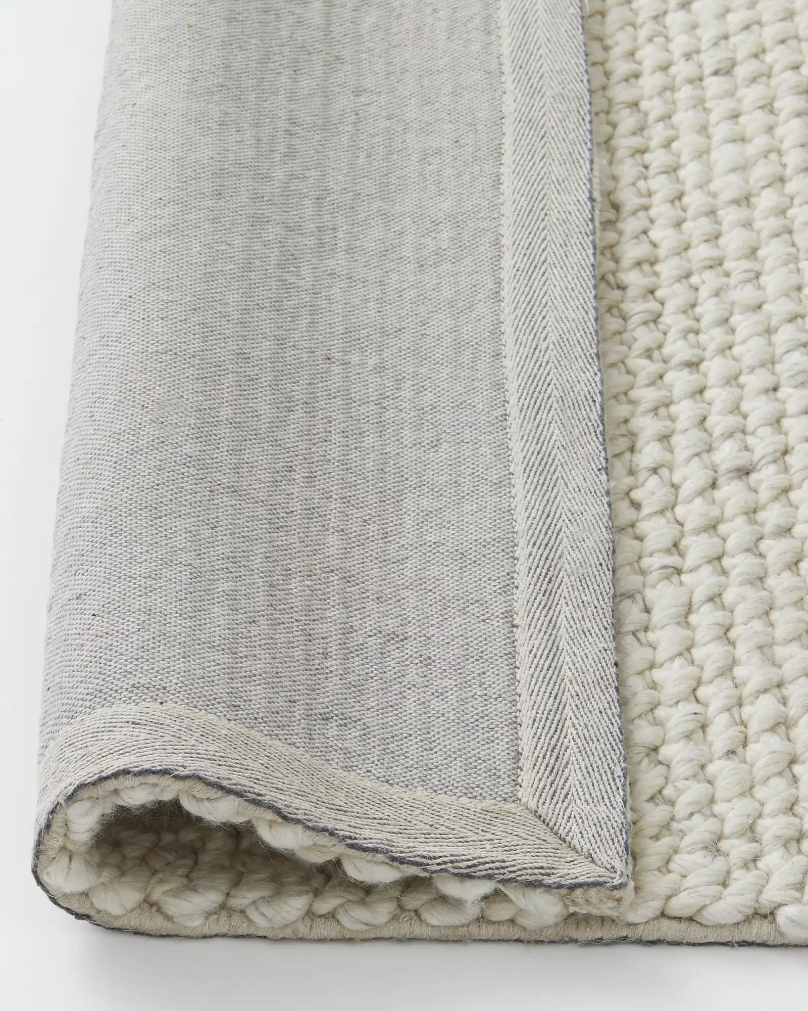 rec8gocJVd2P8o7oM_Emerson_Rug_Seasalt_Backing.webp