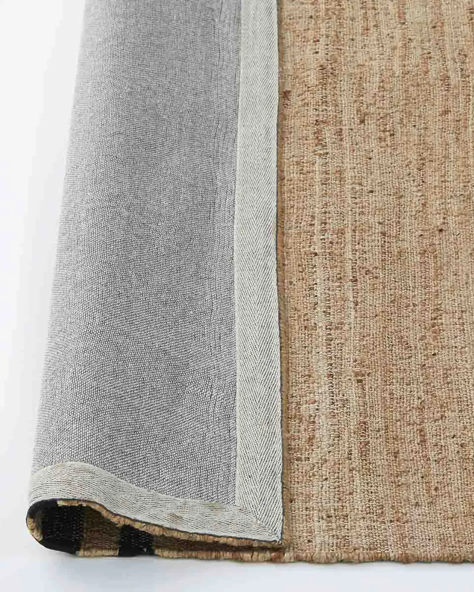 rec39JIGUHmHh0wNg_Umbra_Rug_Natural_Full_Backing.webp
