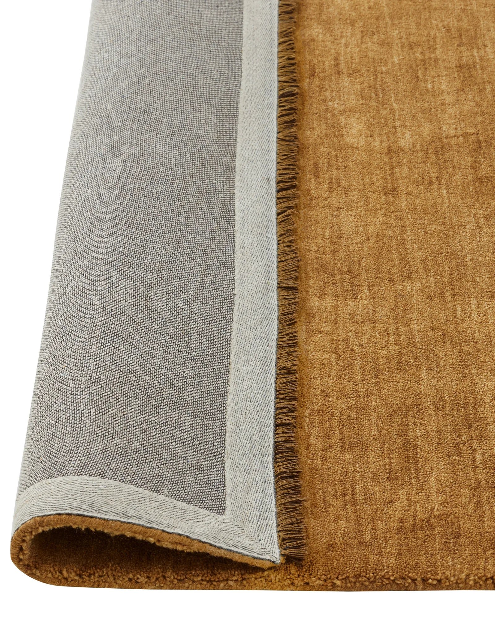 rec4BH1zAM7HhXOBo_silvio-rug-dijon-updated-backing.jpg