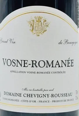 Étiquette de bouteille de vin Vosne-Romanée du Domaine Chevigny-Rousseau, avec un emblème doré et des textes en français.