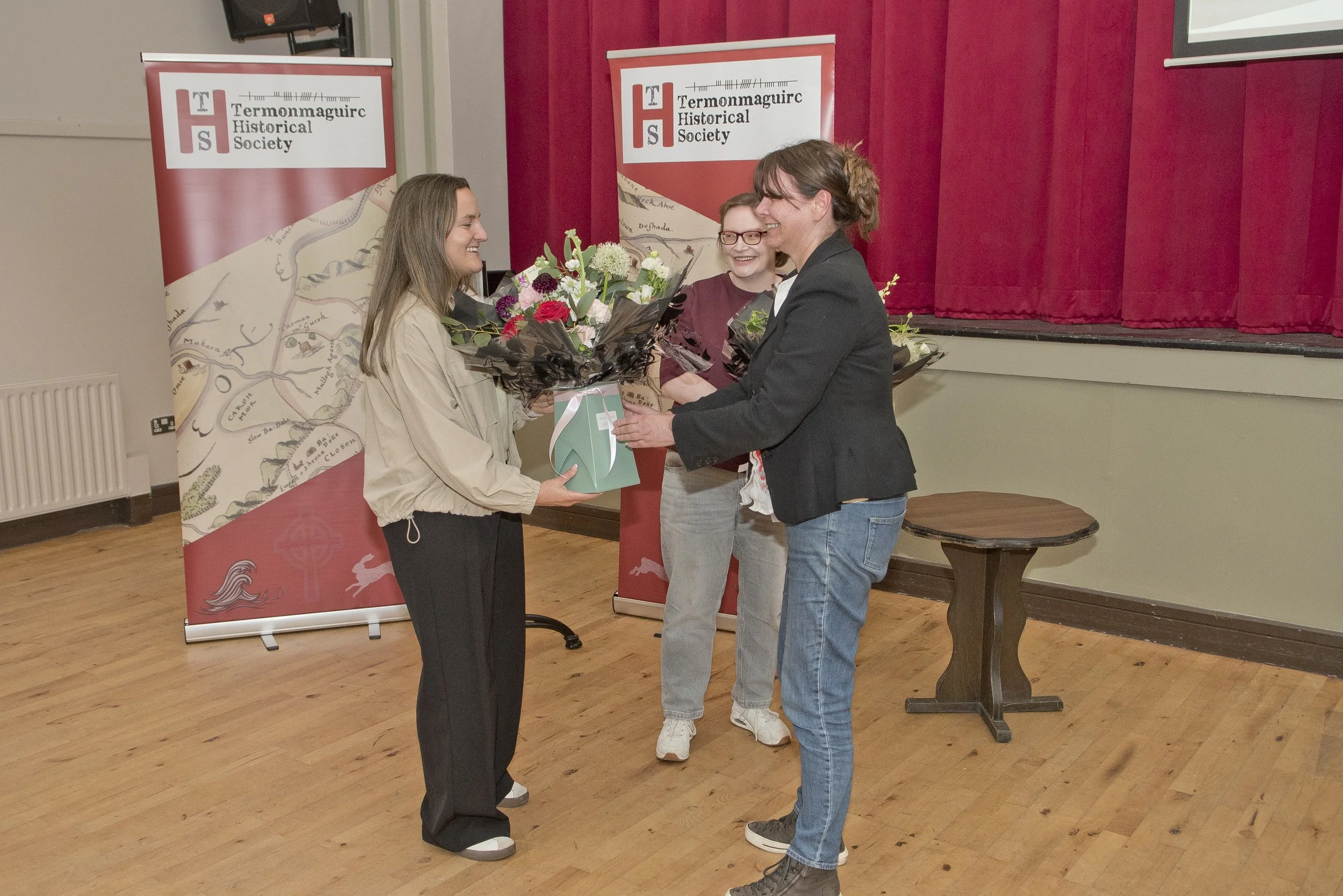 Eimear Montague presents Kate Mc Aleenan with flowers