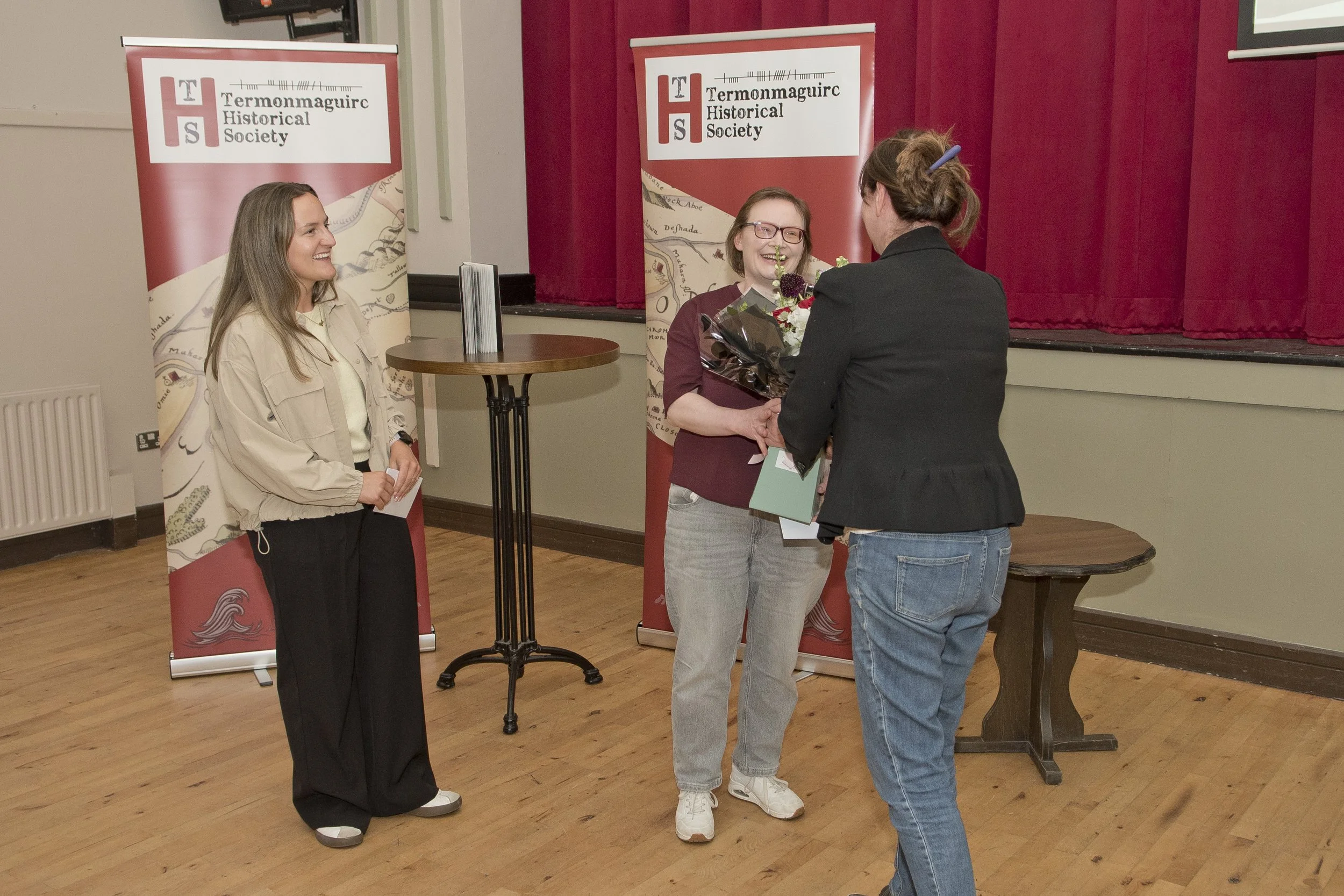 Eimear Montague present flowers to Joan Breen (née Mc Aleer)