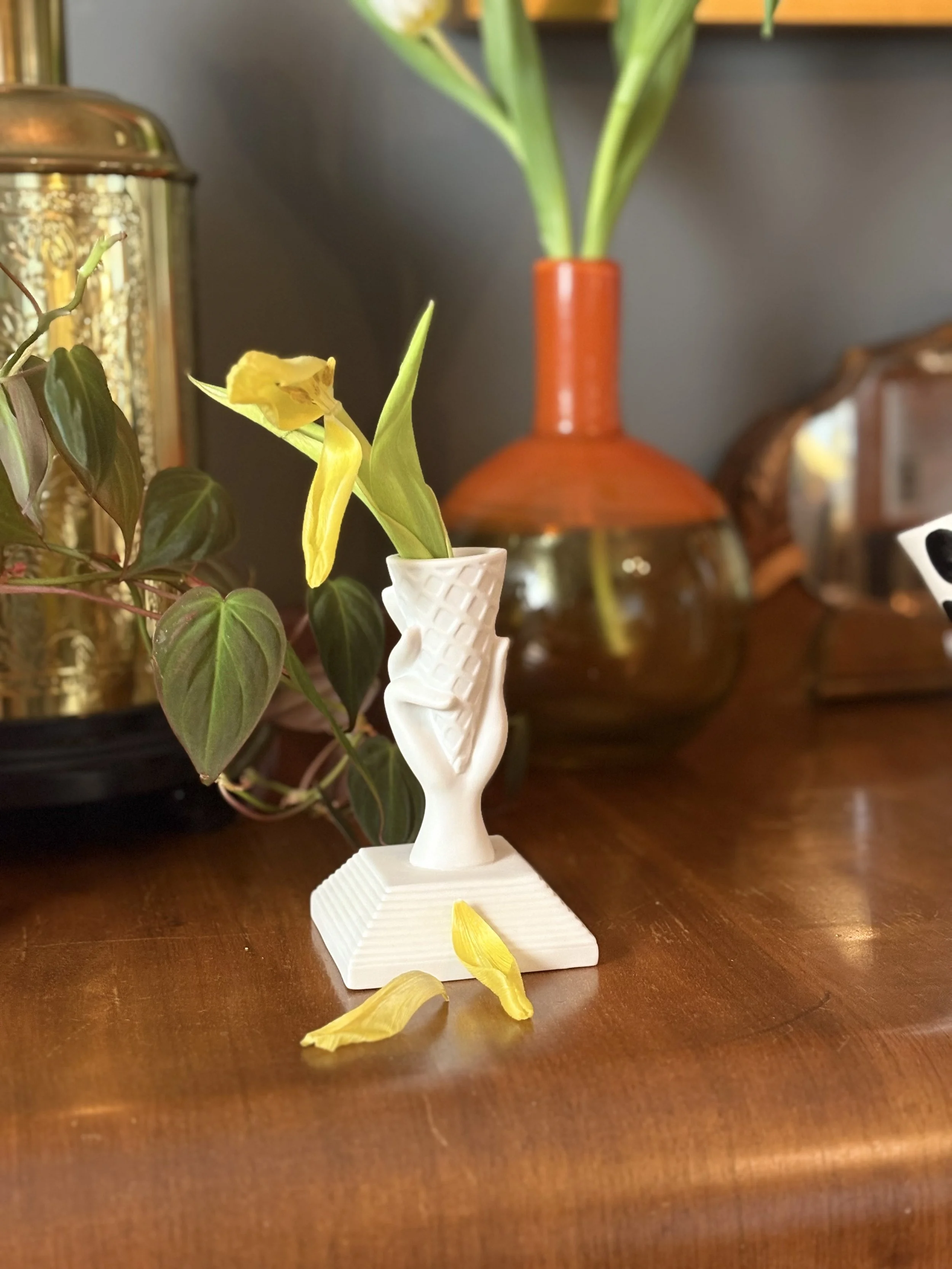 Jonathan Adler I-Scream Match Strike, pre-owned. A white porcelain figurine shaped like a hand holding an ice cream cone.