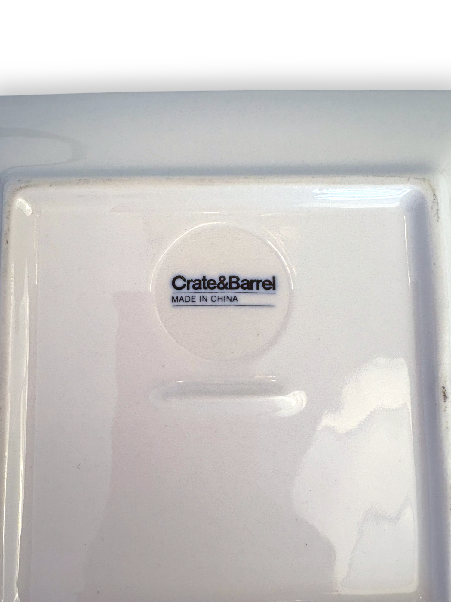 Set of 4 white snowflake embossed plates by Crate & Barrel, pre-owned.