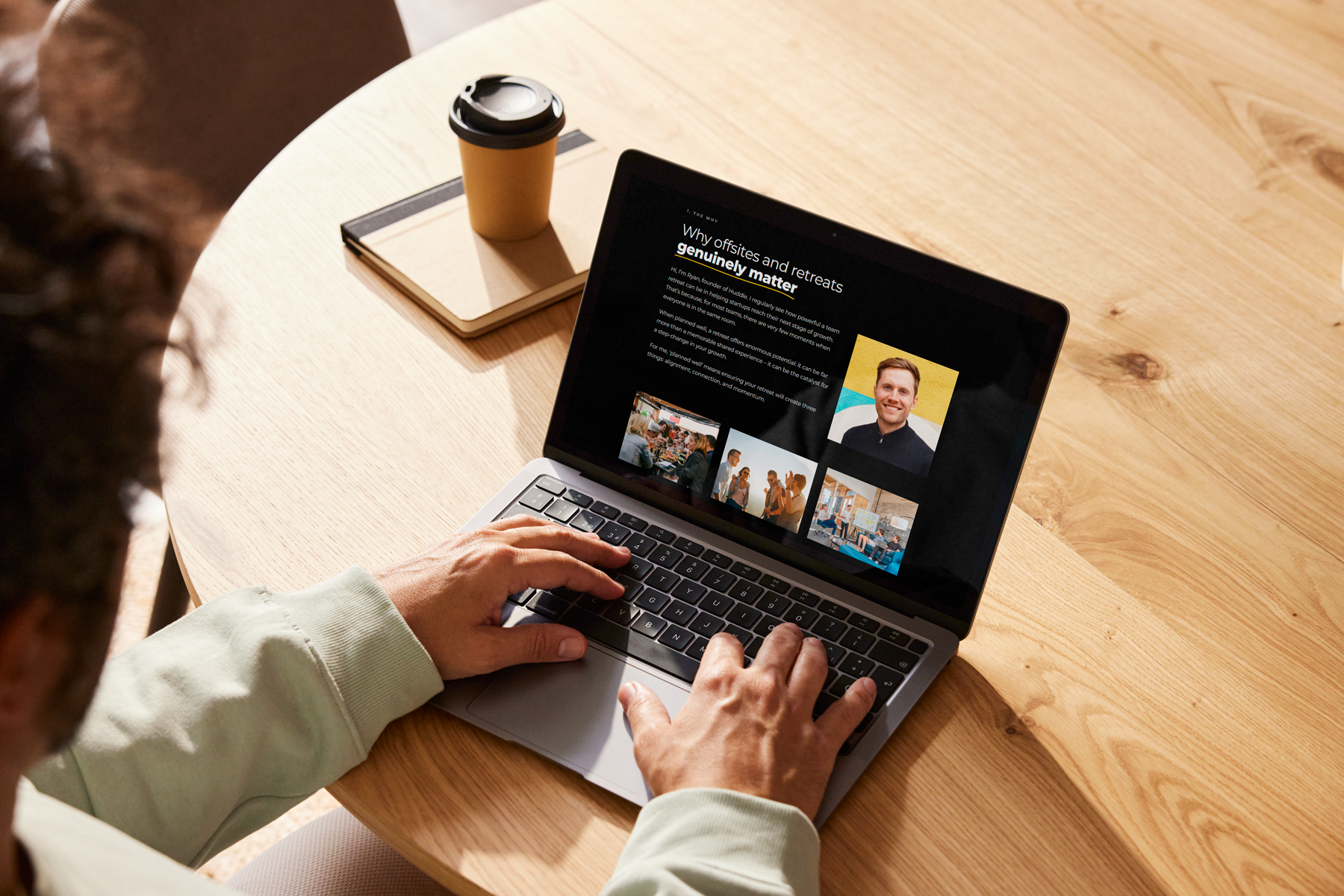 A person viewing a laptop which shows a preview of Huddle's playbook