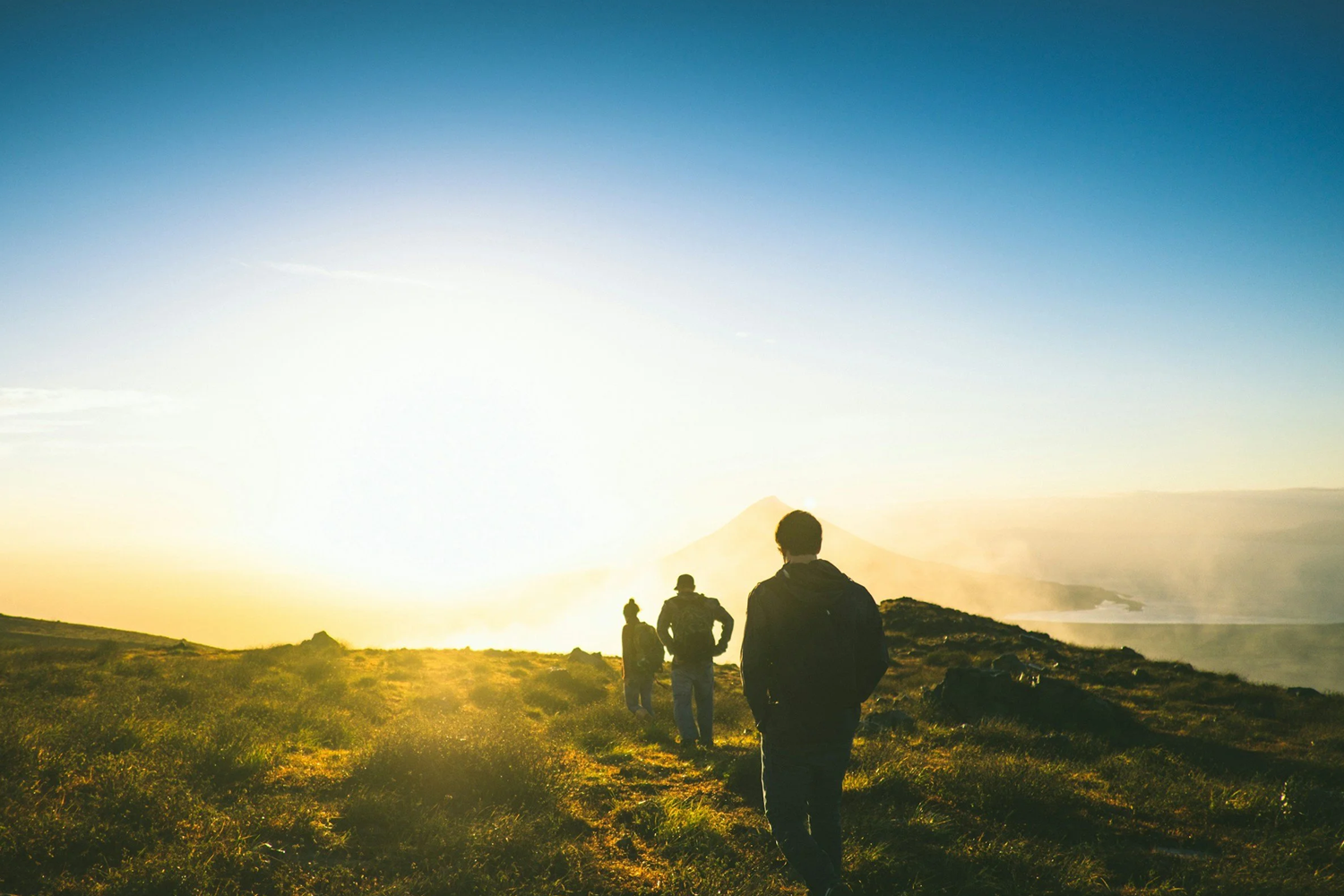 An image of a team going hiking during a company offsite