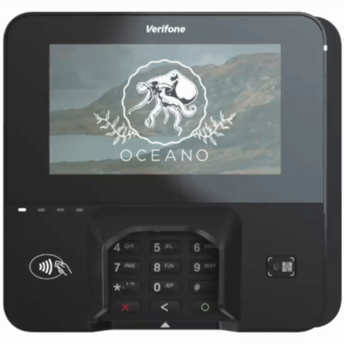 Close-up of a Verifone OCEANO payment terminal with a digital screen displaying the OCEANO logo featuring a lion with a sword and the word 'OCEANO' underneath.