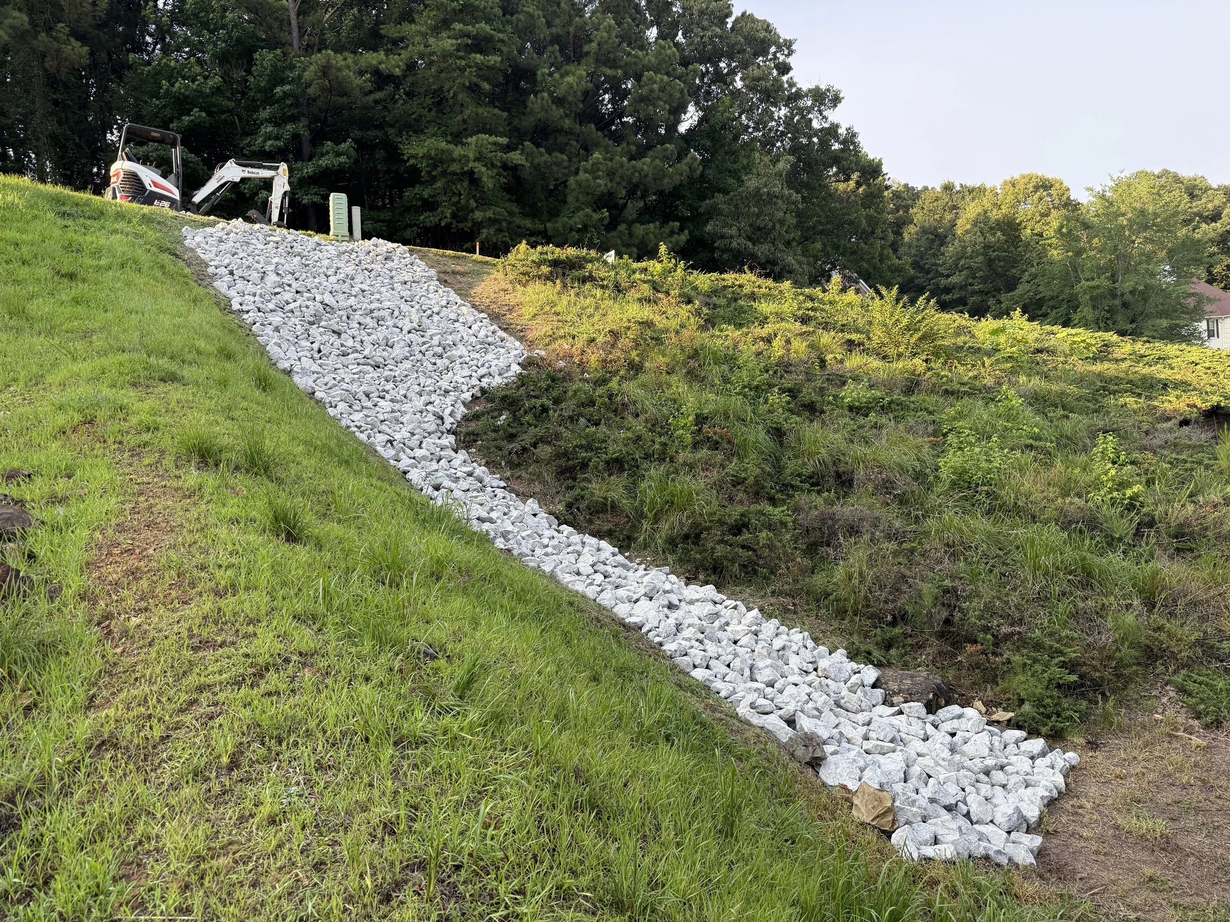 Slope Stabilization- Class 1 Rip Rap- Heatherwood