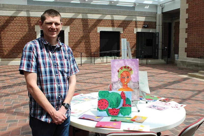 Man Posing with Artwork.jpg