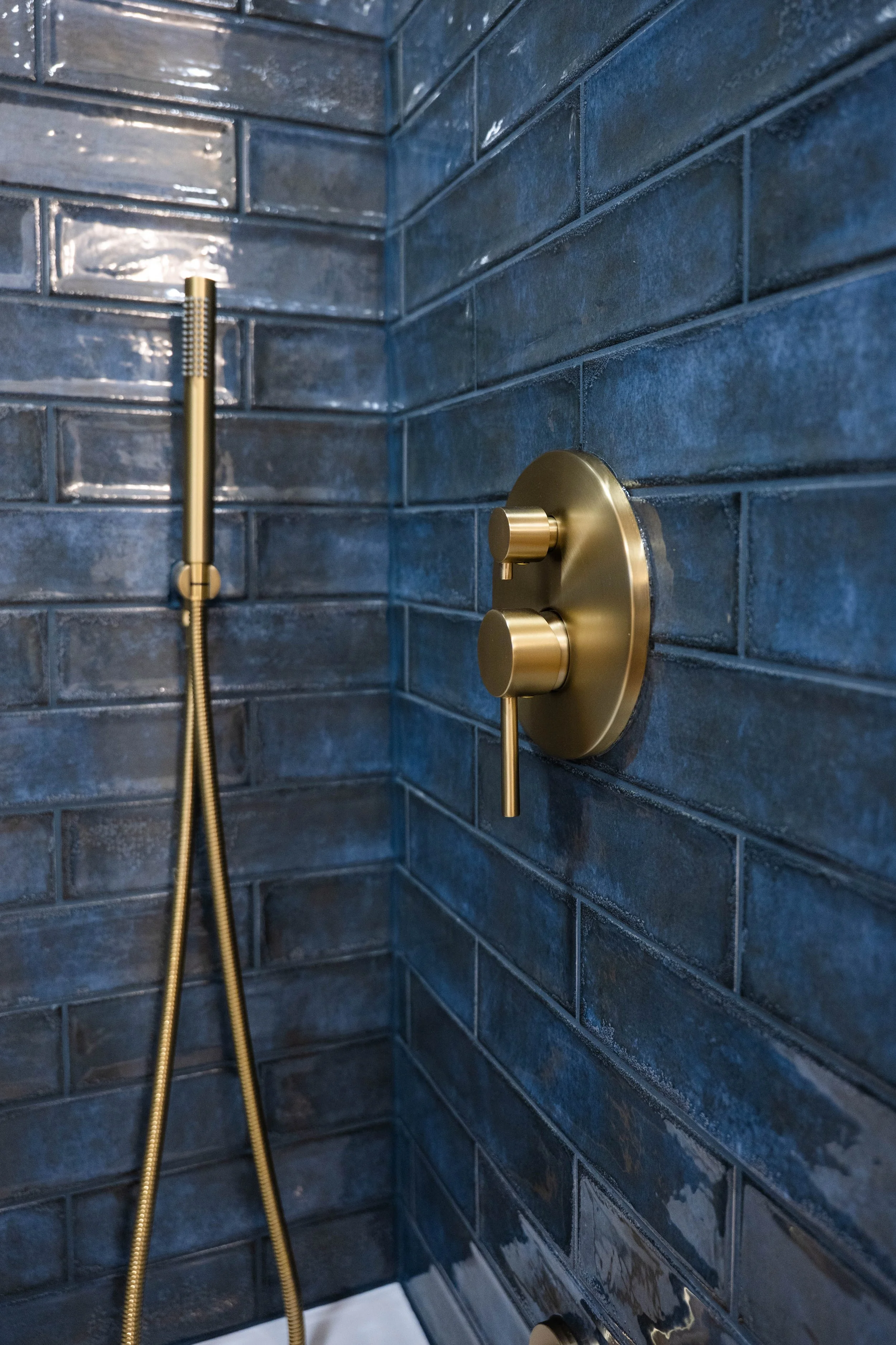 Branding photography of a Phoenix bathroom remodel featuring new tile and modern fixtures.