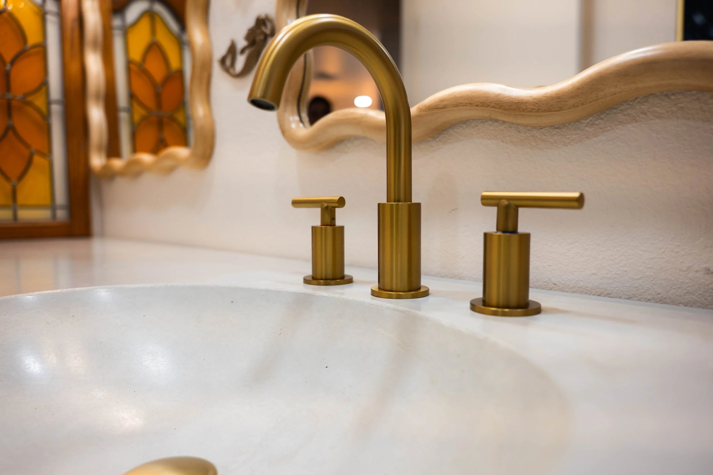 Final reveal photo of a Phoenix bathroom renovation featuring new flooring, vanity, and modern hardware.