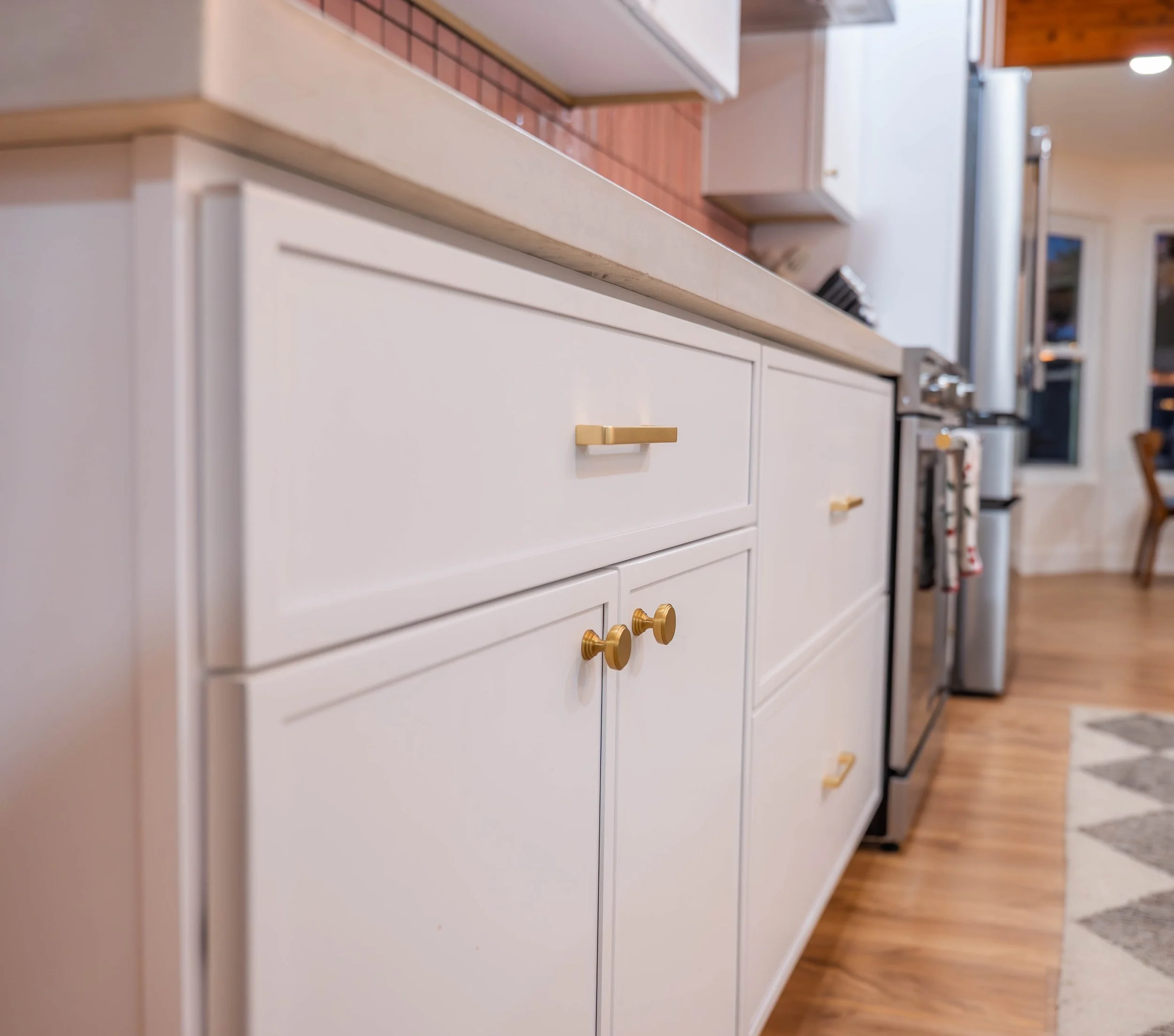 Phoenix home renovation photo showcasing a bright, contemporary kitchen with custom cabinetry.