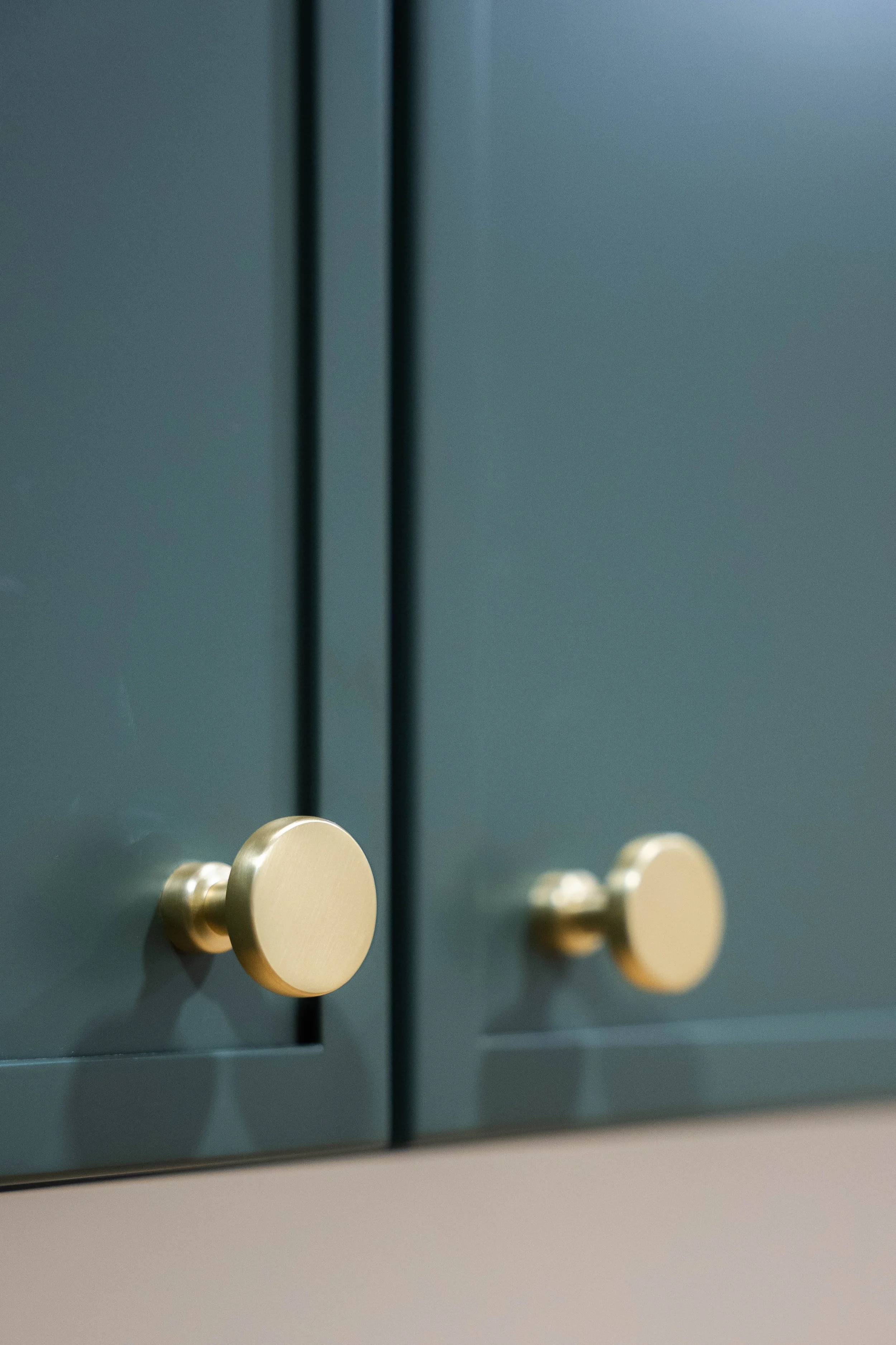 Professional interior image of a Phoenix laundry room remodel with updated cabinetry and clean finishes.