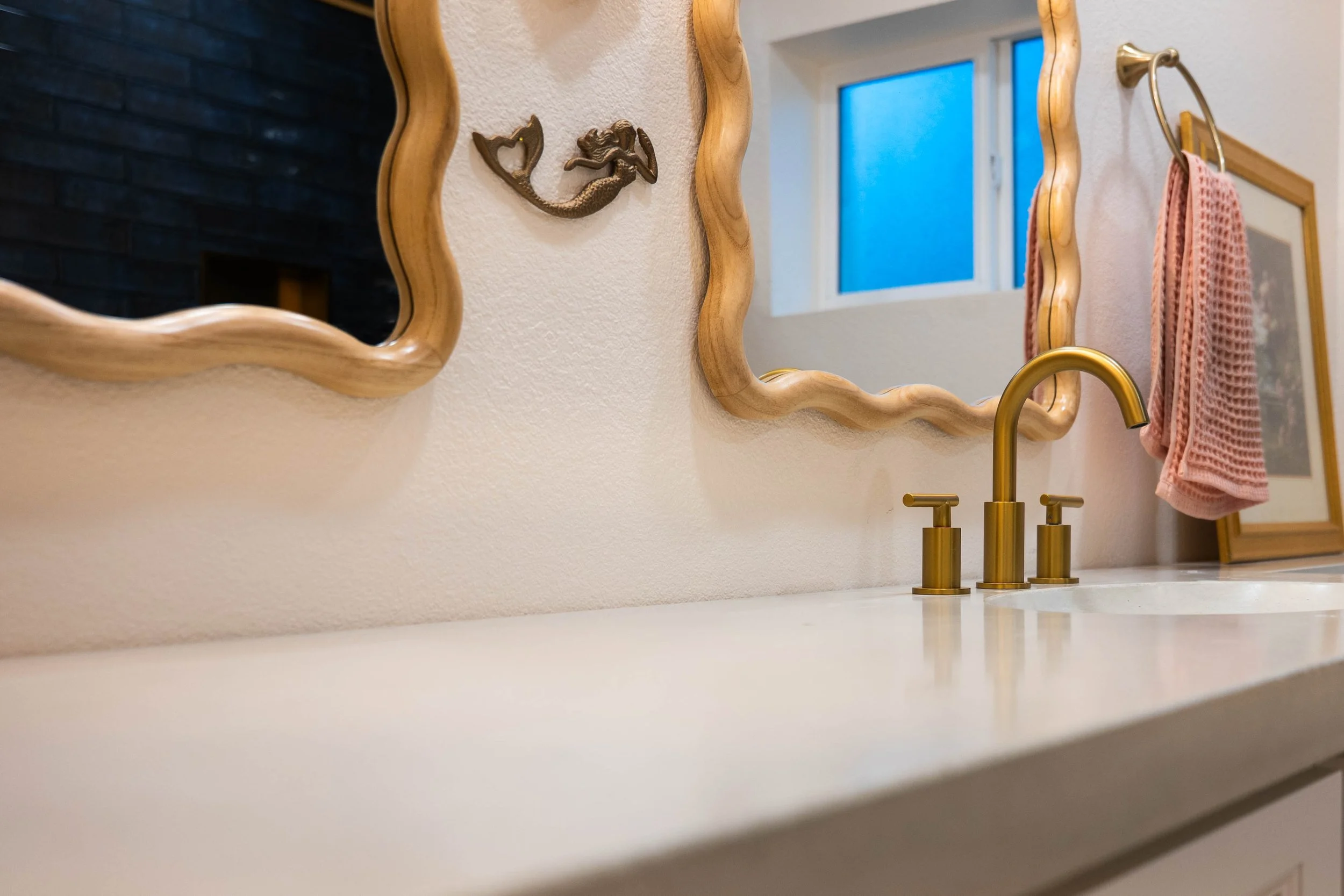 Commercial interior shot capturing premium tile details and refreshed layout in a Phoenix bathroom redesign.