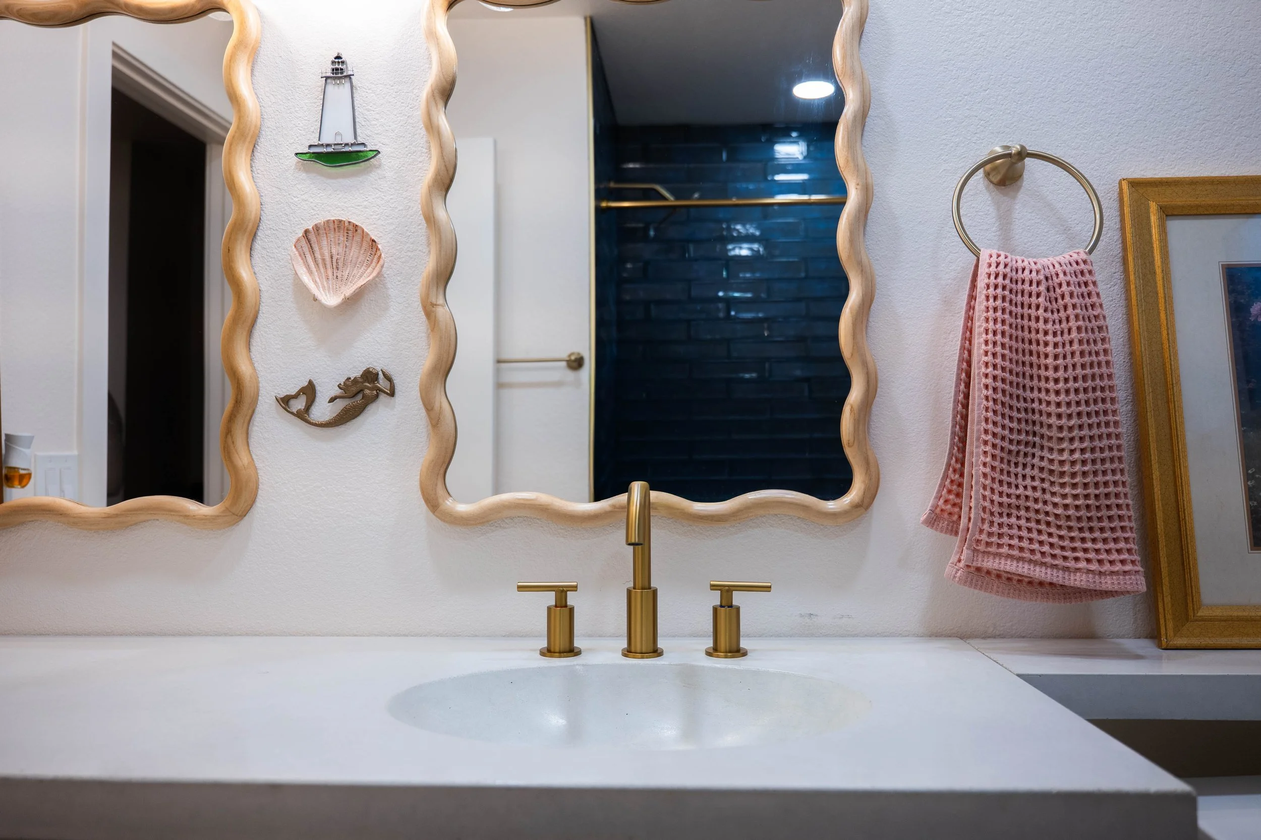 Professional interior photo showcasing a fully transformed Phoenix bathroom with upgraded materials