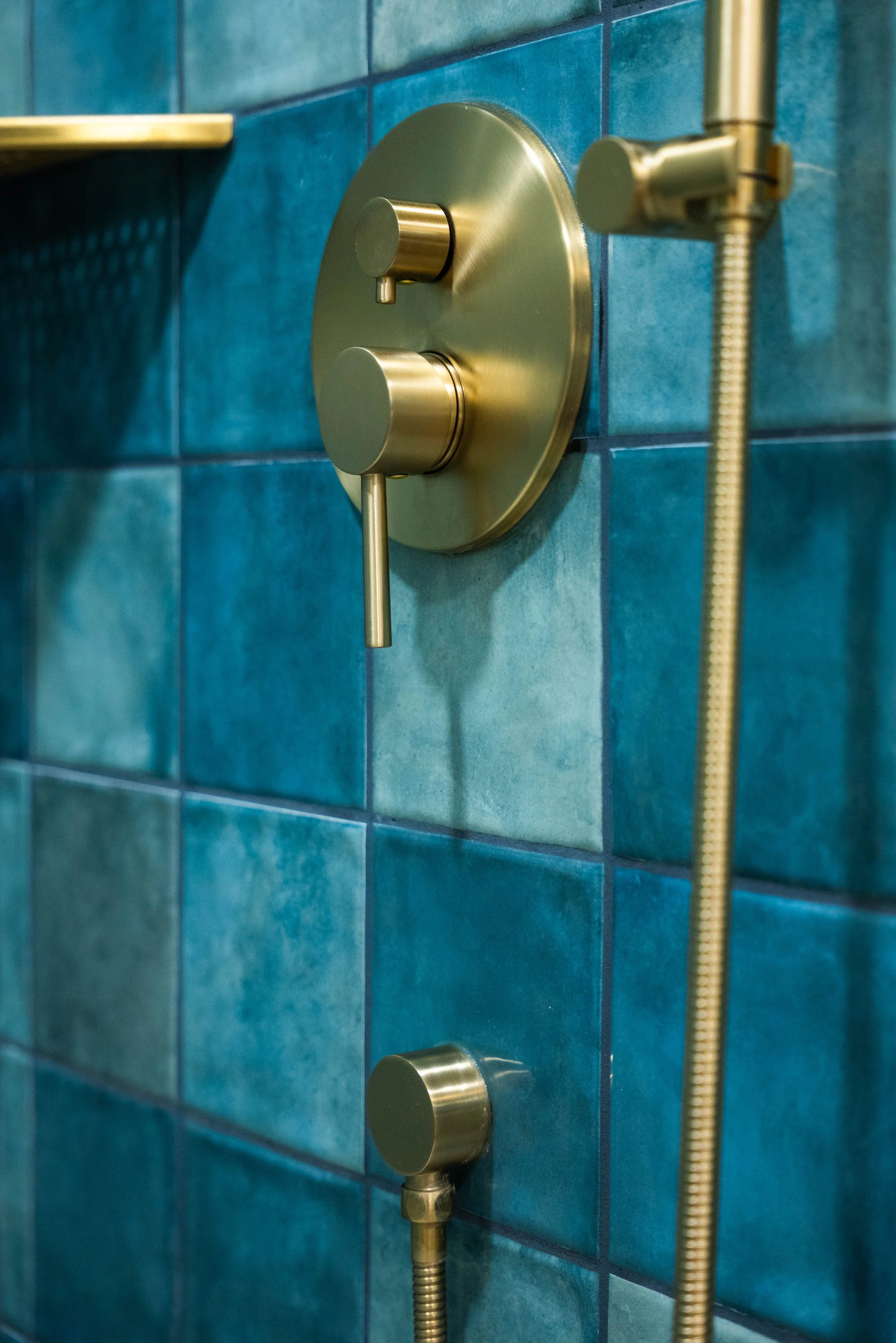Shower renovation image showing custom tile and glass updates in a Phoenix bathroom