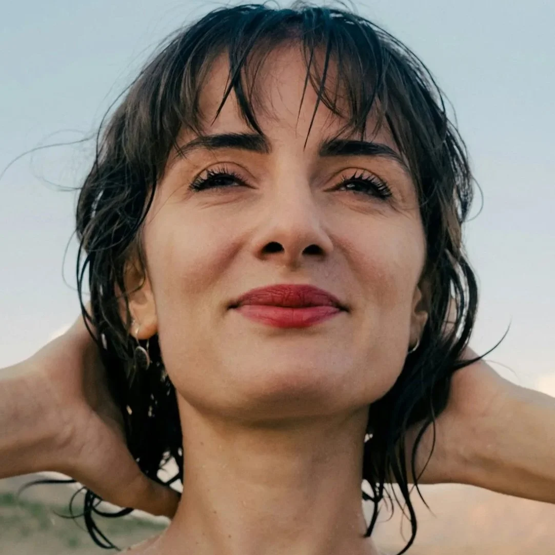 woman looking content at the sky