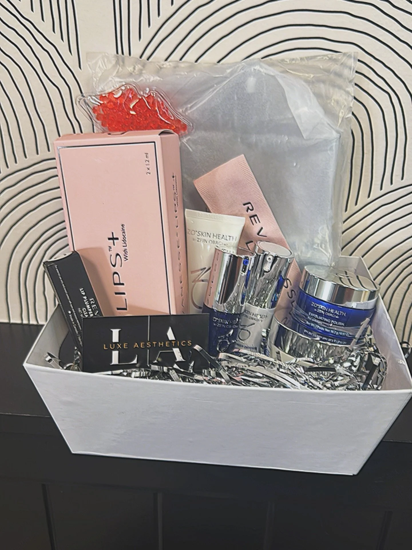 Luxe Aesthetics Jacksonville is thrilled to promote the Make-A-Wish Foundation by donating these amazing products to their Wishmakers Ball raffle in Jacksonville this Saturday! 🎉✨ This basket includes ZO skin care items, a syringe of lip filler, and