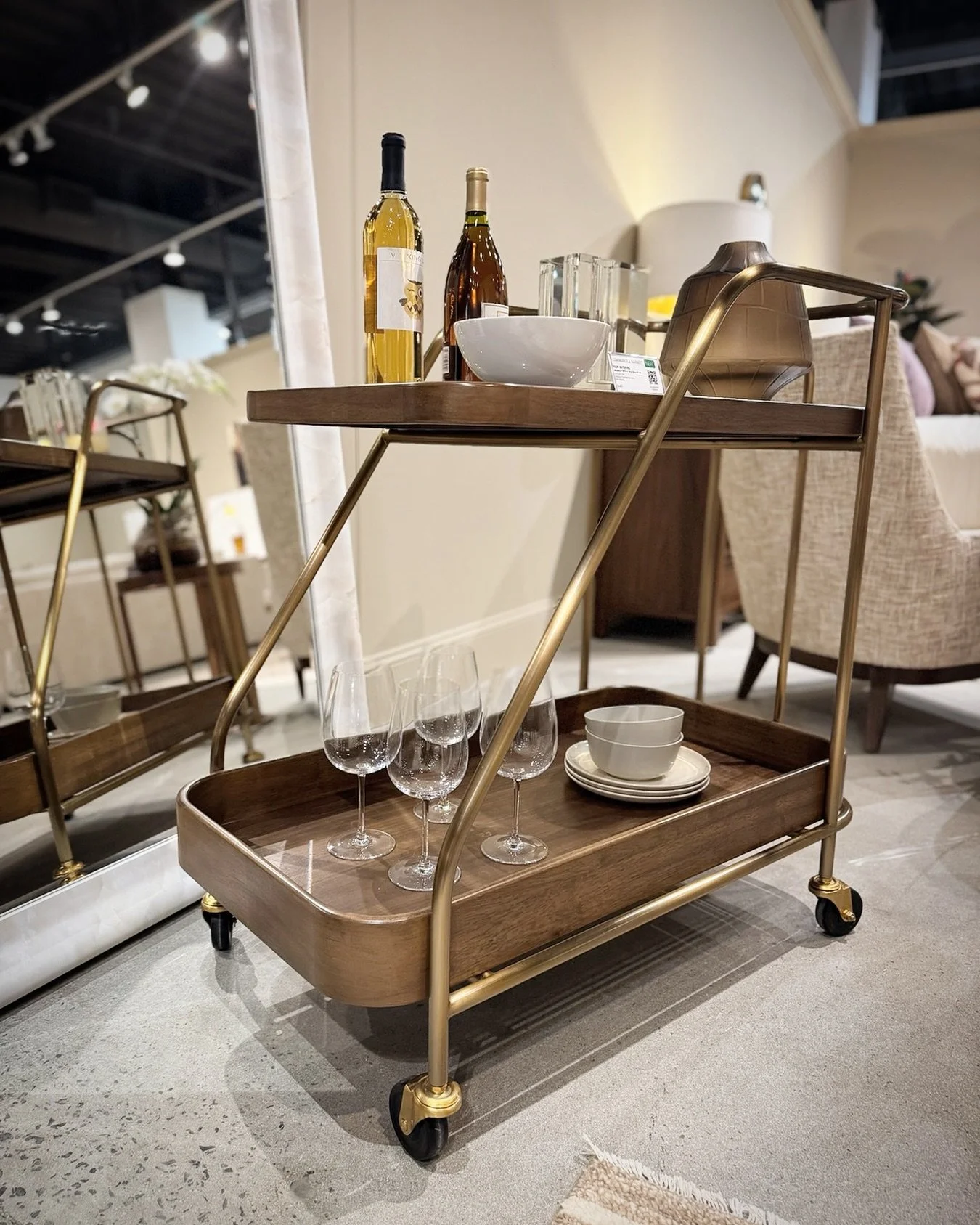 It&rsquo;s midweek&hellip; time to pour yourself something fabulous! This bar cart shines alongside the Eleana Collection, introduced at this market. Cheers to style and good vibes! 

#EleanaCollection #HookerFurniture #BarCartGoals #HighPointMarket 