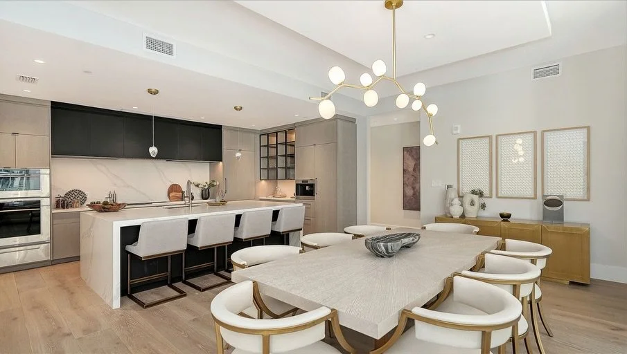 Where every seat feels like the best one in the house.
A dining space designed for gathering&mdash;clean lines, warm tones, and effortless flow from kitchen to table. Whether it&rsquo;s a quiet dinner or a full house, this is where moments turn into 