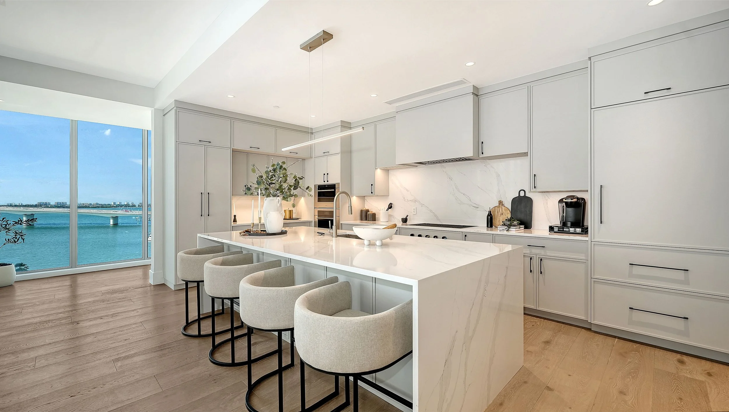 luxury interiors Sarasota, designer condos Sarasota, high-end finishes Sarasota, chef kitchen