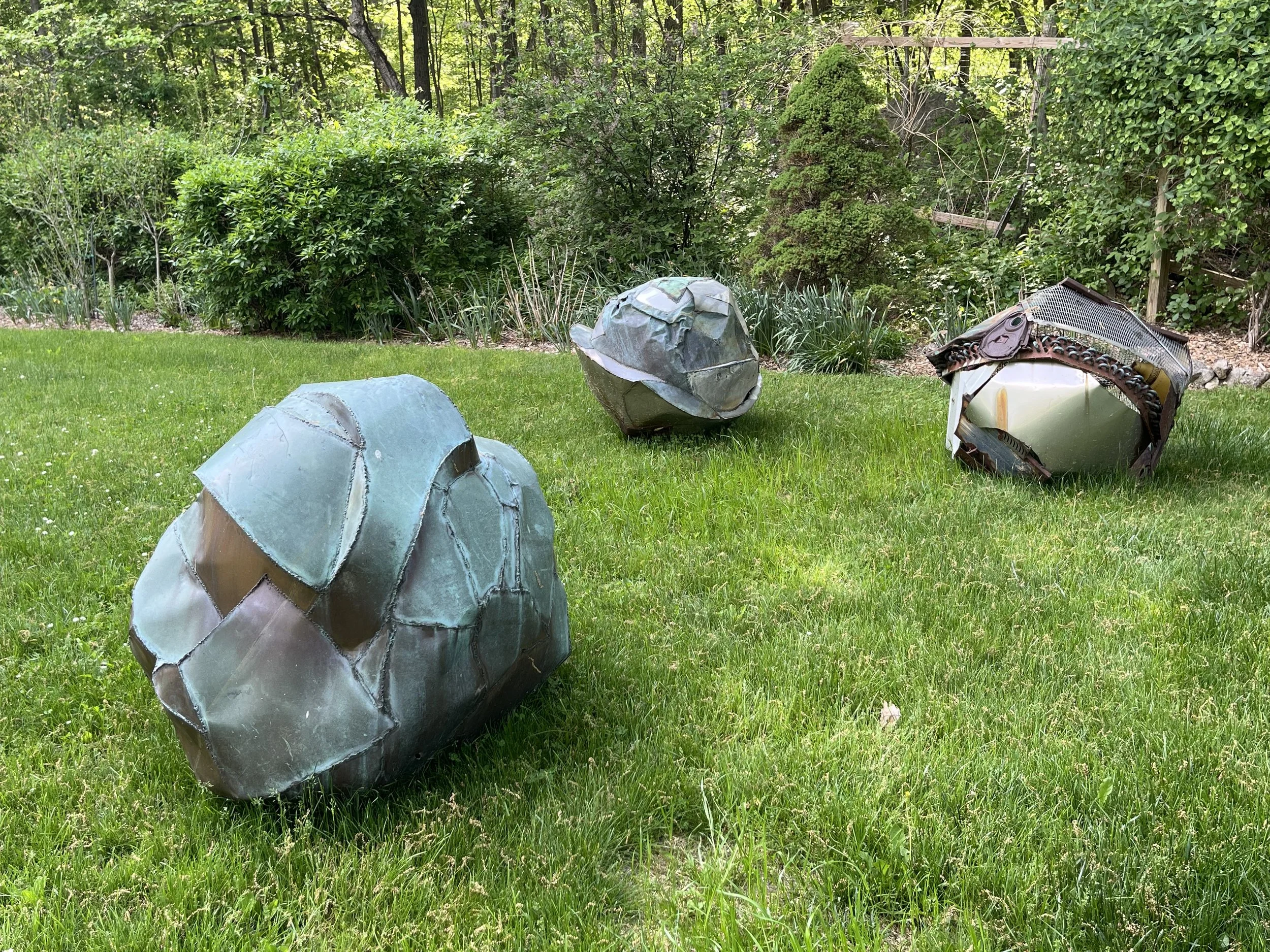 (Left) Grace Knowlton, Copper Sphere, 44"

(Center) Grace Knowlton, Mixed Metal Sphere, 34"

(Right) Grace Knowlton, Found Materials Sphere, 34"