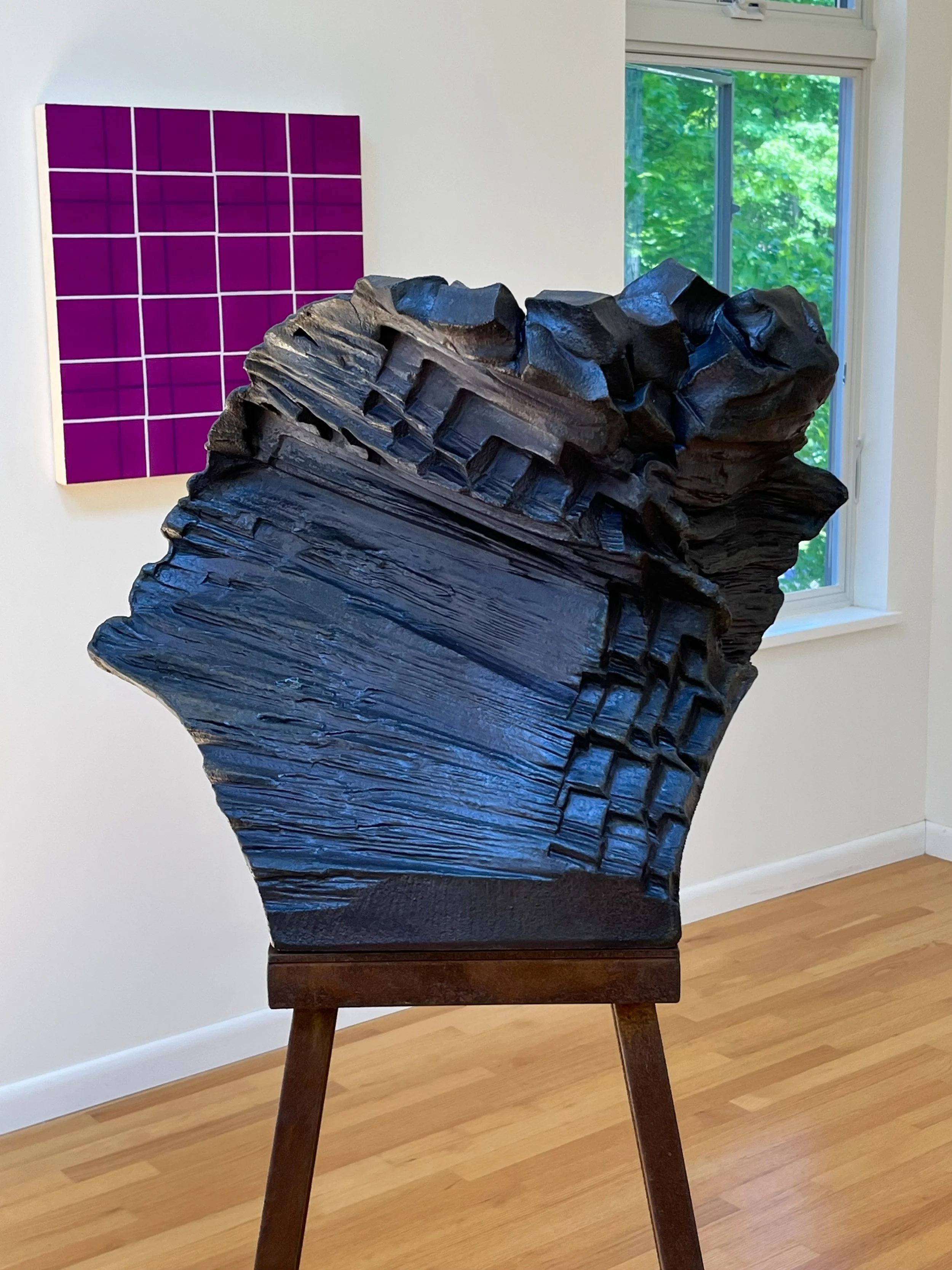 Tony Moore, No Time To Die, 2026, wood-fired ceramic, porcelain, black iron oxide, steel, 56 ¾” x 27 ½” x 25”