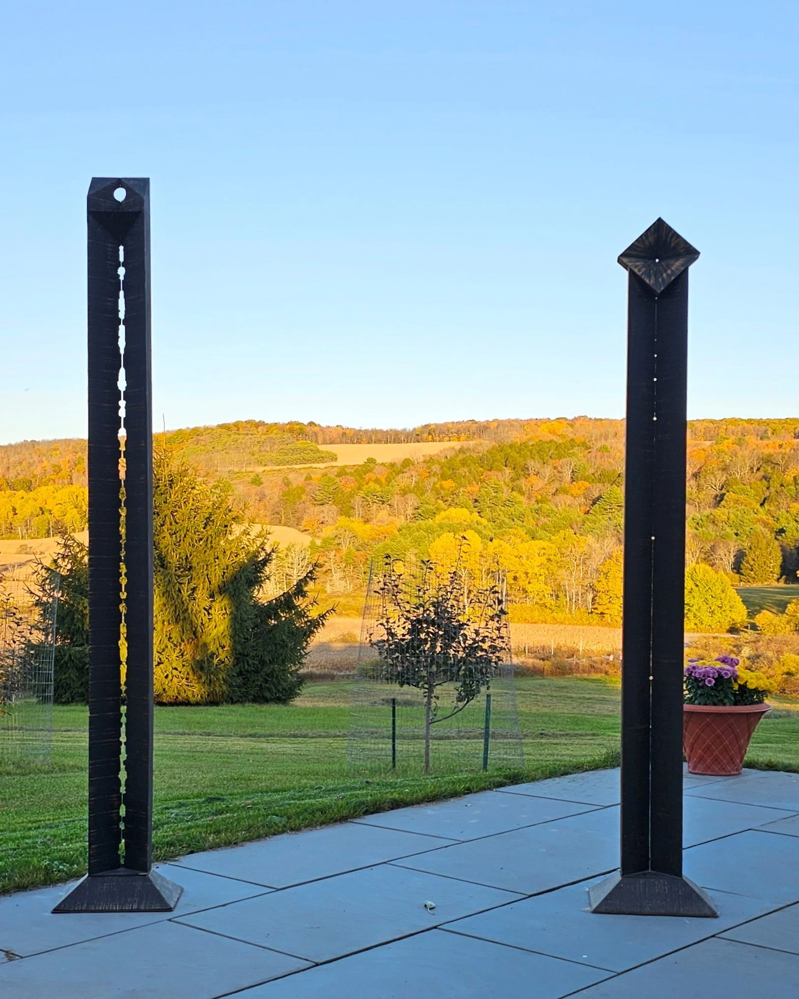 James Gregg Herman, Sentinel I, 2001, painted Poplar wood, base: 10” x 14”, shaft: 92” x 6.5” x 3.5”
  Sentinel II, 2001, painted Poplar wood, base: 10” x 13.5”, shaft: 86” x 6.5” x 3.5”  