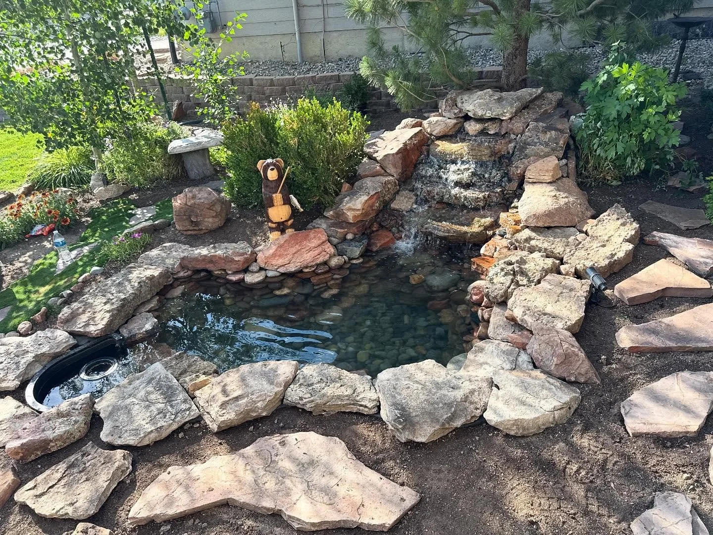 Another pond in the books! ✅
We wrapped up this build today and it turned out incredible&mdash;natural stone, crystal-clear water, and the soothing sound of a custom waterfall.

There&rsquo;s nothing like bringing a space to life with flowing water ?