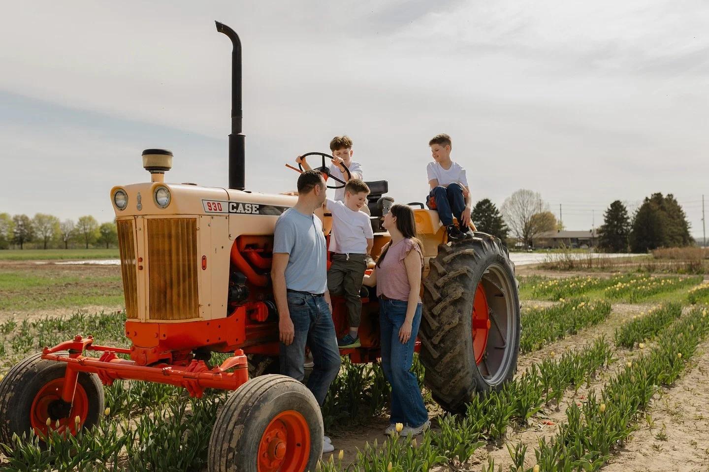 Sometimes the best thing you can do during a family session? 

Let the kids take the lead. 

I love when a session goes off the script - like when this crew made a beeline for the tractor instead of the tulips. No need for stiff poses or forced smile