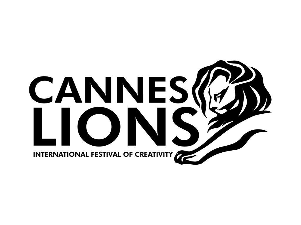 Shrek logo in green with stylized "S" on white background