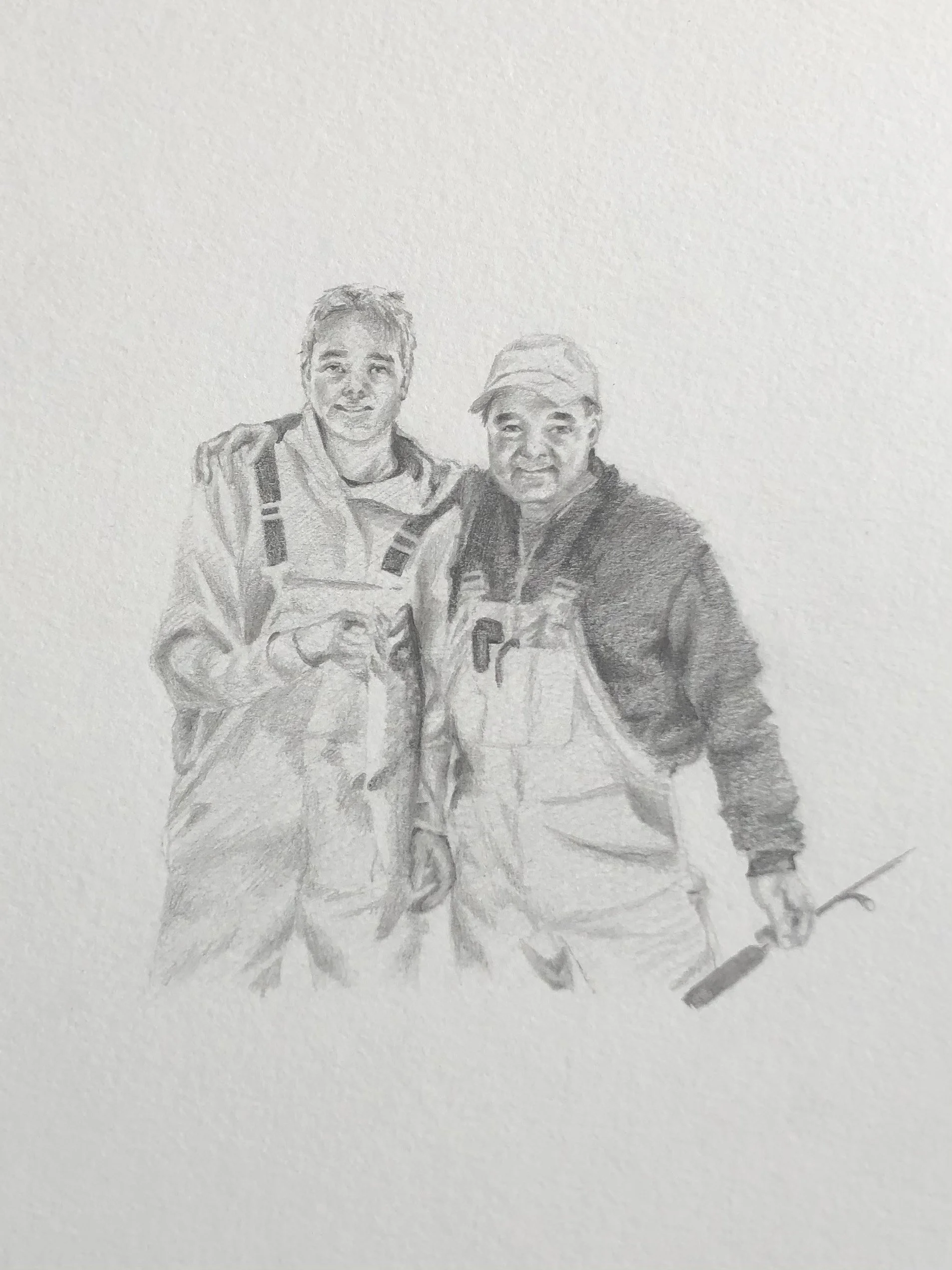 Commissioned drawing by Rebekah Victoria depicting a father and son. The hand-drawn artwork captures their likenesses and expressions with detailed line work, highlighting the bond, love, and connection between parent and child.