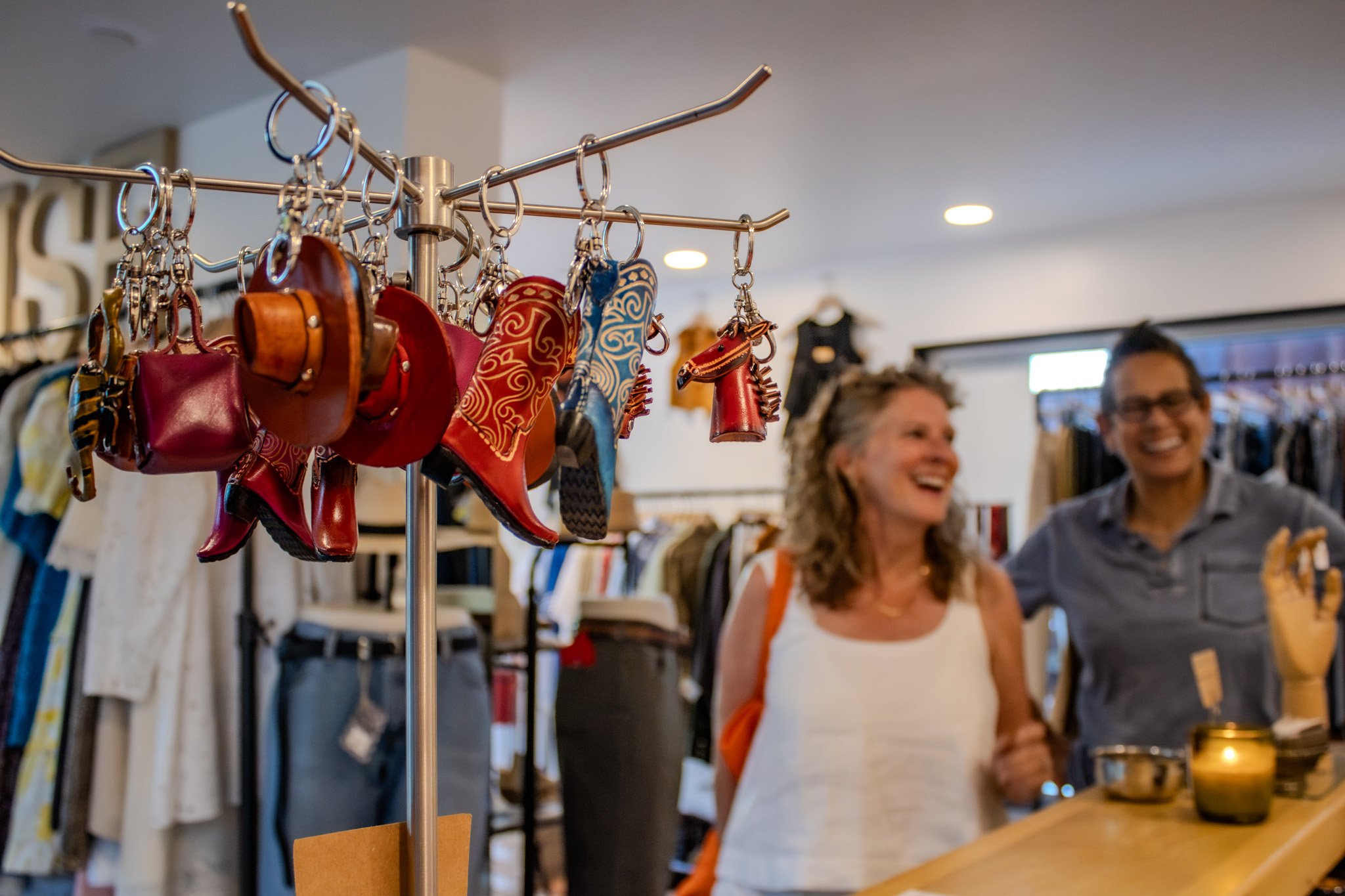 Customers browsing inside ORTENSE, a vintage and secondhand shop at MSA Annex in Tucson.