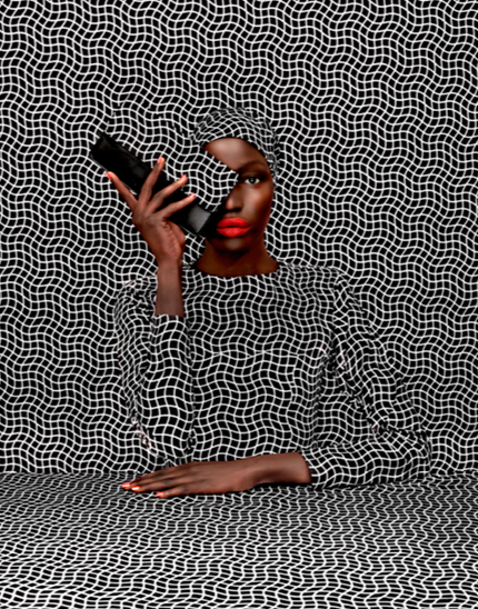 Woman with dark skin and red lipstick holding a phone, surrounded by an optical illusion black and white patterned background and clothing.