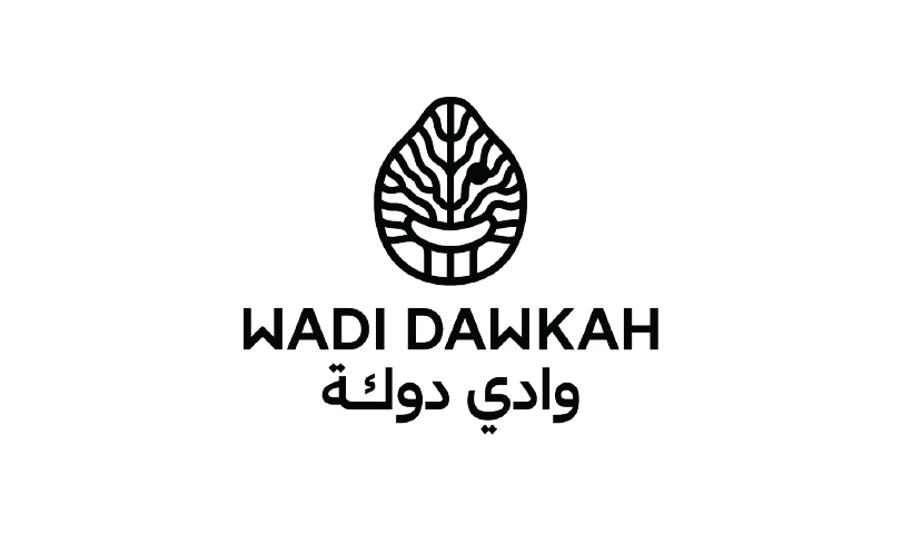Logo with a stylized tree leaf above the text 'WADI DAWKAH' and Arabic script beneath.