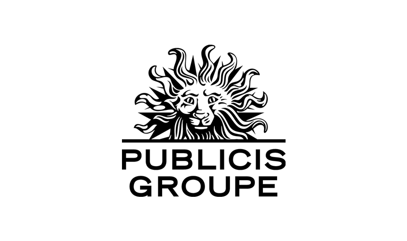 Black silhouette of a person sitting at a desk using a computer.