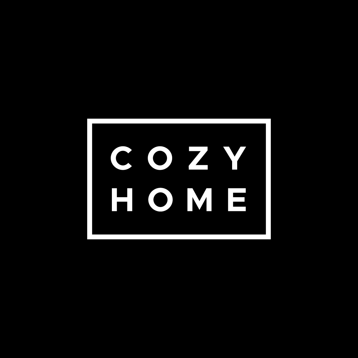Black background with a white, rectangular outline containing the words 'COZY HOME' in capital letters.
