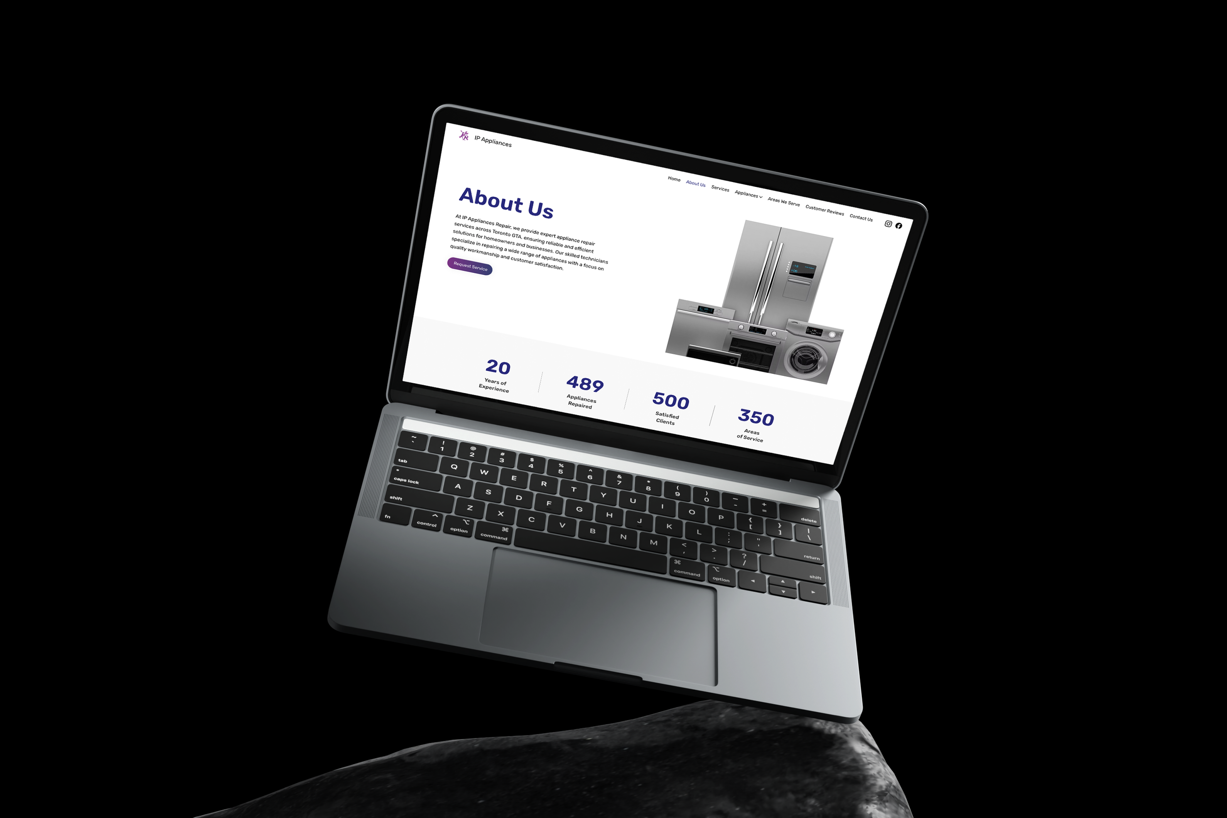 A silver laptop floating above a dark surface displays an 'About Us' webpage for appliance repair services.