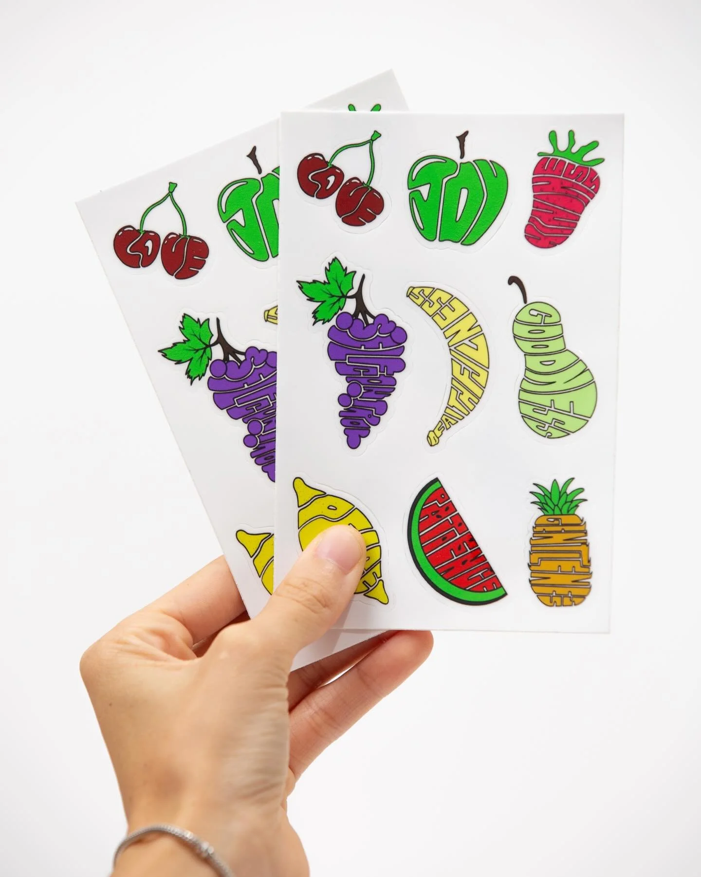 Fruit of the Spirit Sticker Sheet 
🍒🍊🍌🍏🫐🍇

SHOP AT:
www.leadwithlove.art
