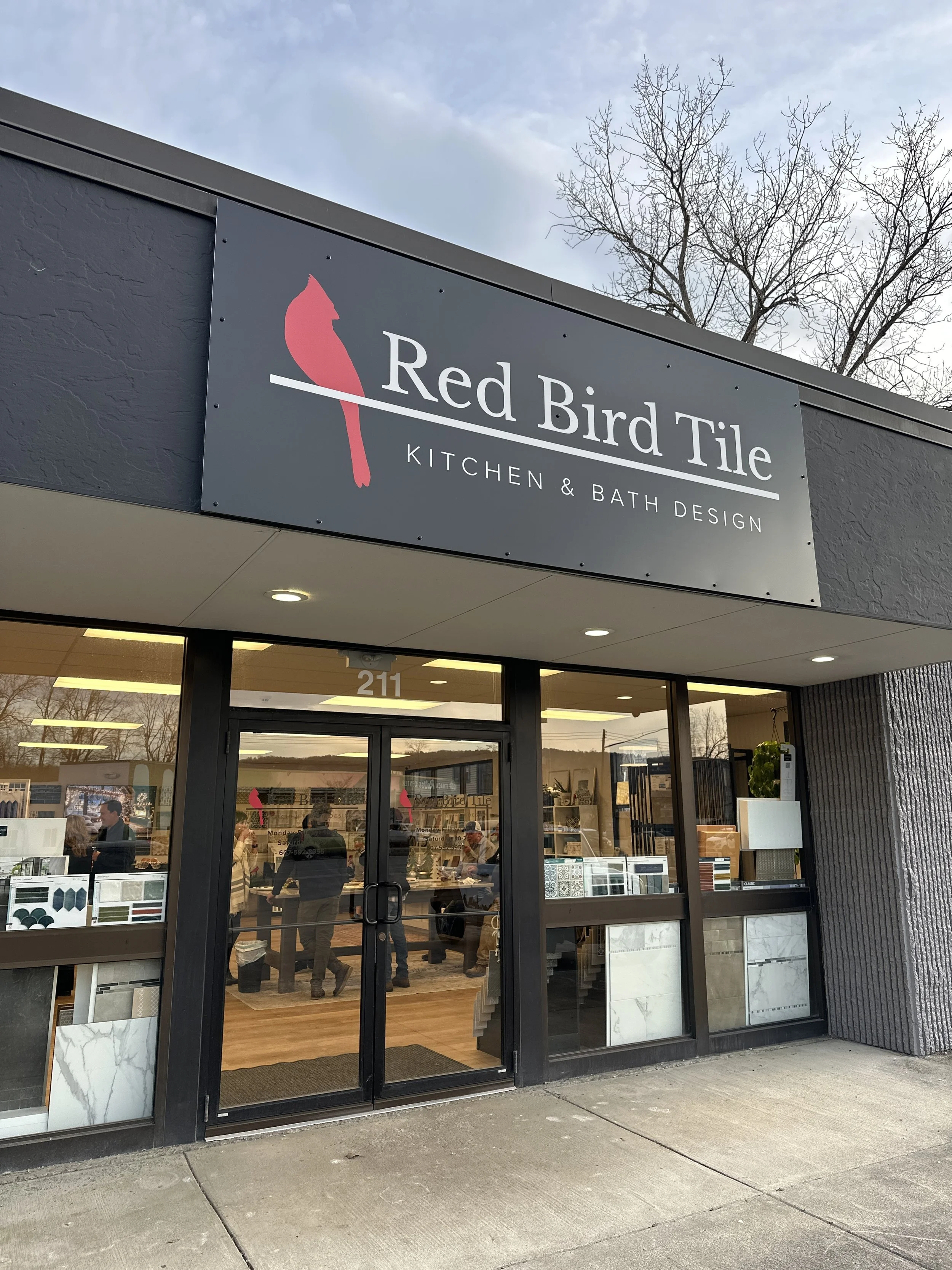 Storefront for Red Bird Tile featuring the logo Nana Potenza designed for the small business.