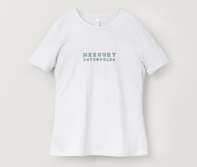 White T-shirt with the word "MERCURY" written in uppercase letters and the words "RETROGRADE" written upside down below it.