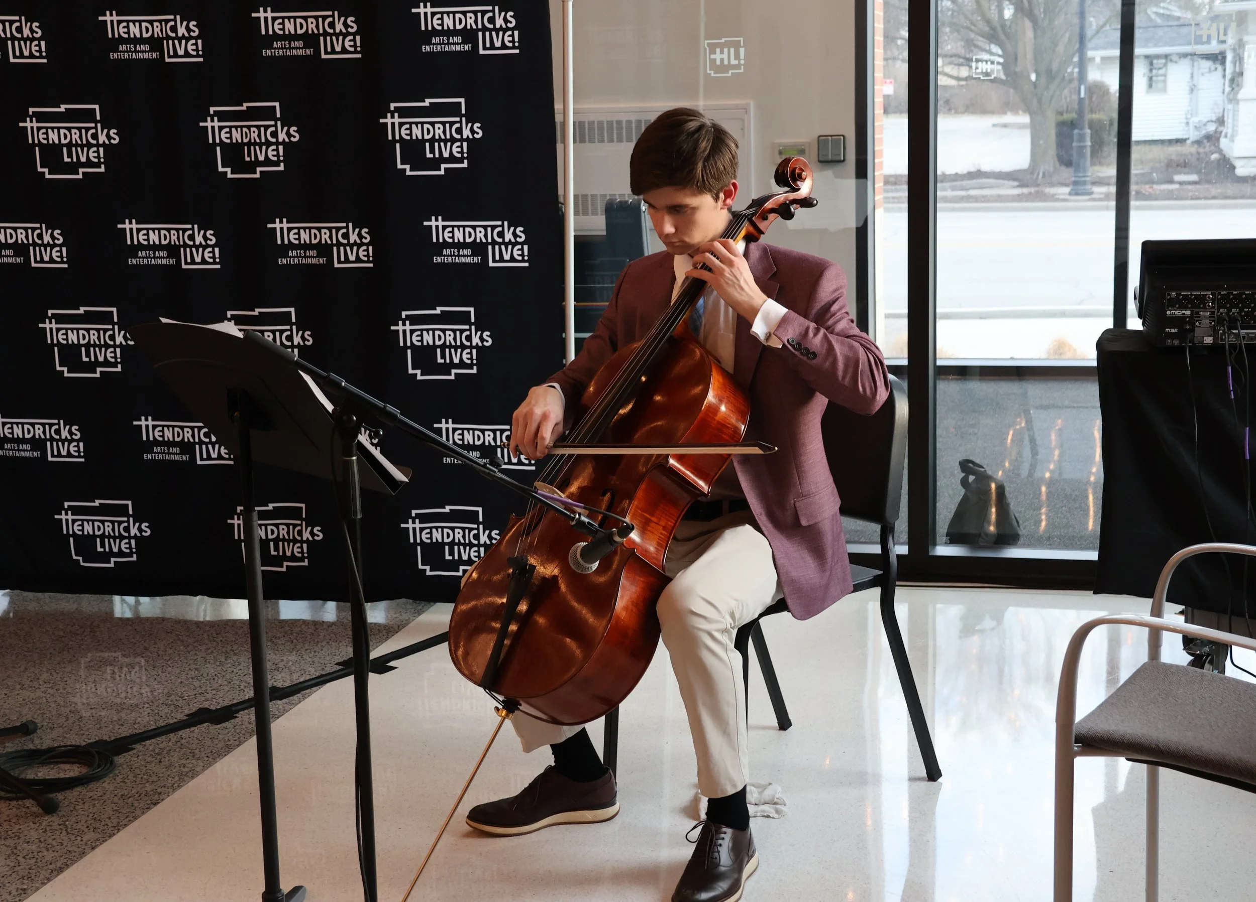 High schooler playing cello.JPG