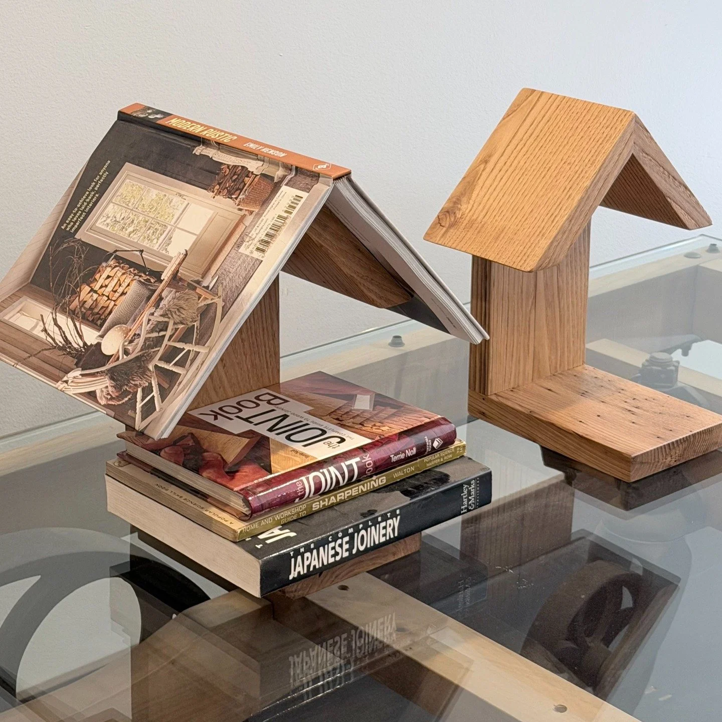 The cutest lil thing in the shop for sure. We build beams, mantels, countertops, cabinetry. . . and then sometimes little hickory houses. These bookends came out of our shop and we're not sorry about it! In fact, we are very grateful for the special 