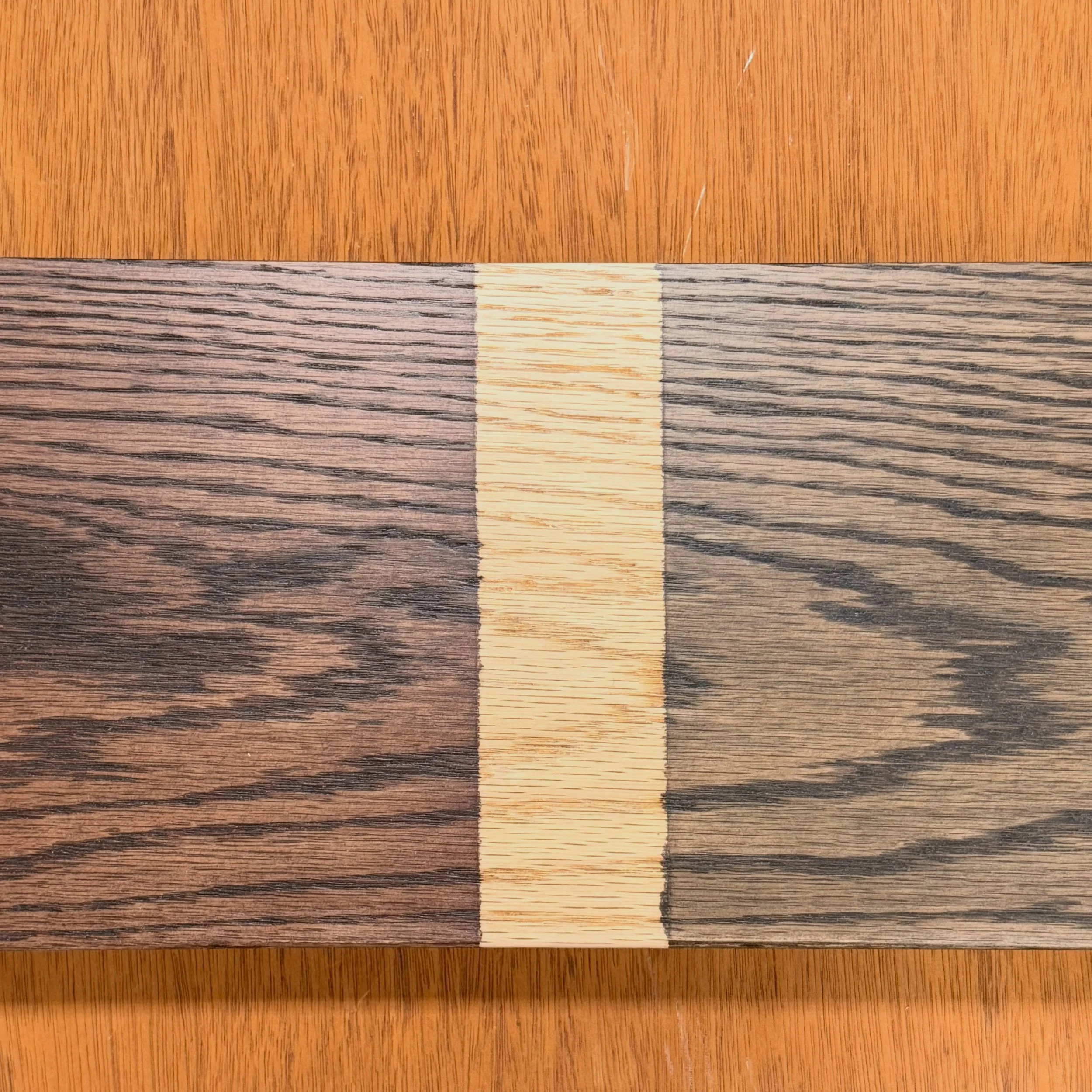 Same wood, two different stains with natural sandwiched in between. The same finish can look completely different depending on species, grain direction, and how the wood takes it. This step is how we make sure you get exactly what you&rsquo;re expect